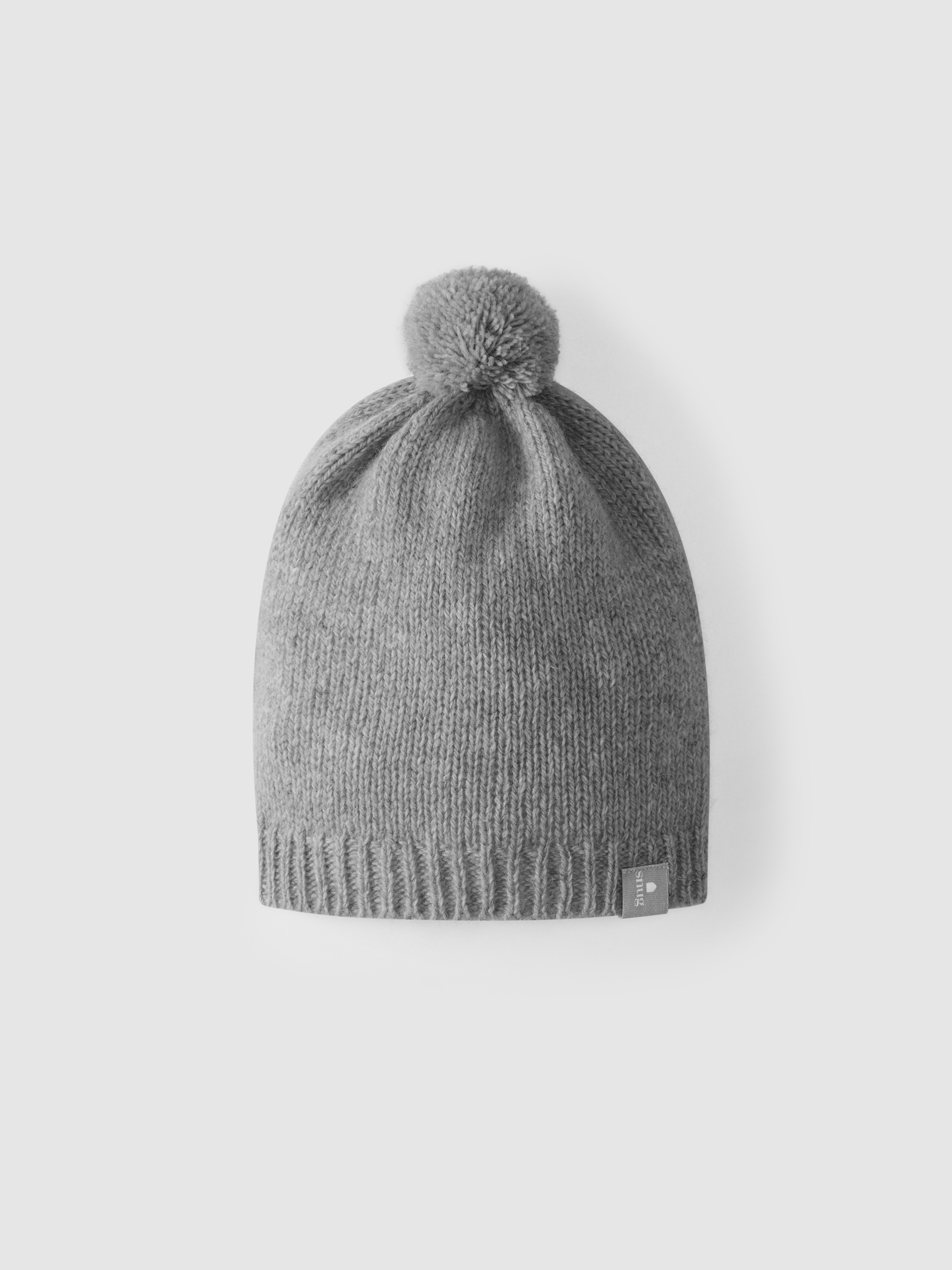 Knitted hat with pom-pom