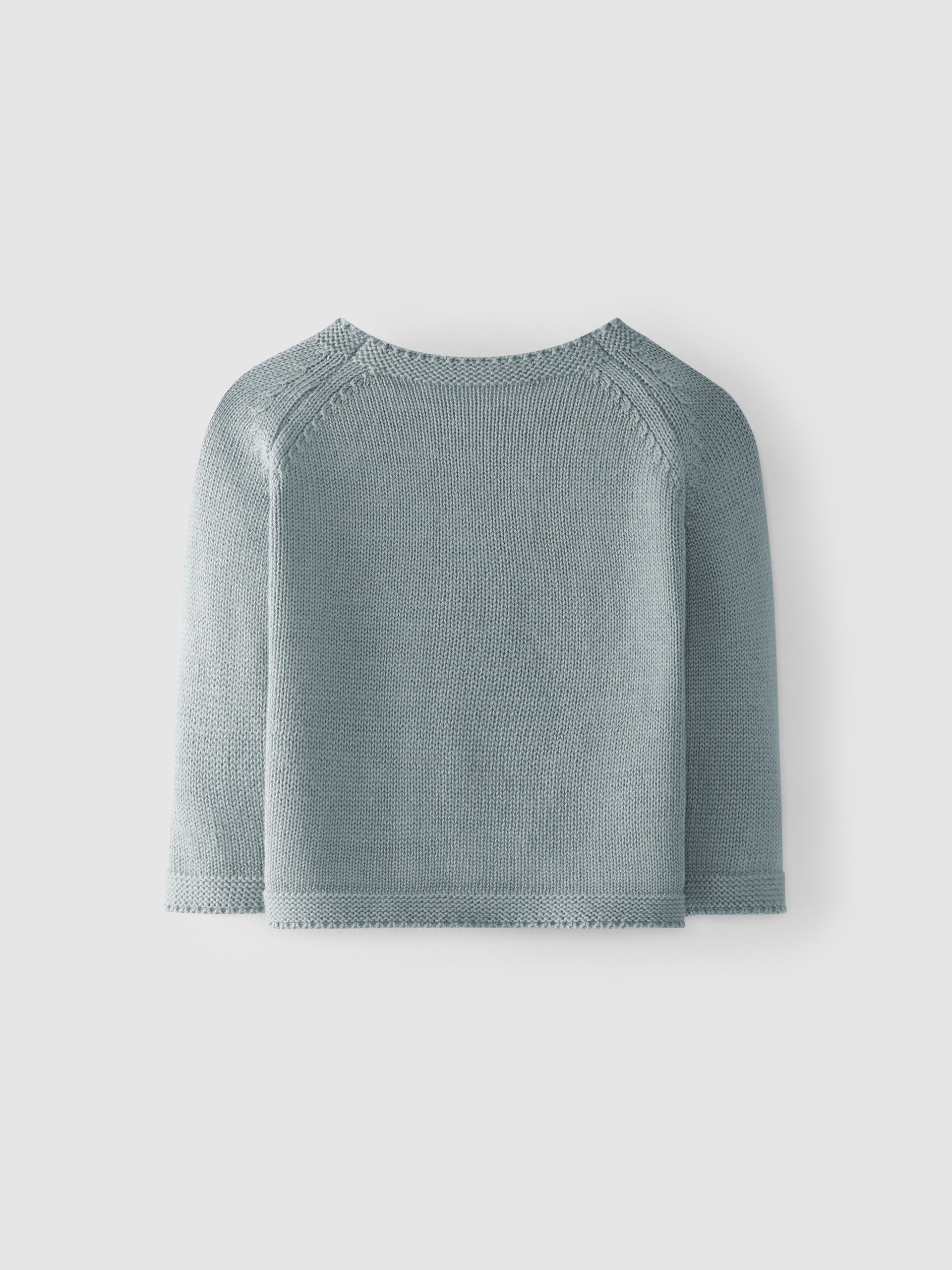 Casaco tricotado com bolsos