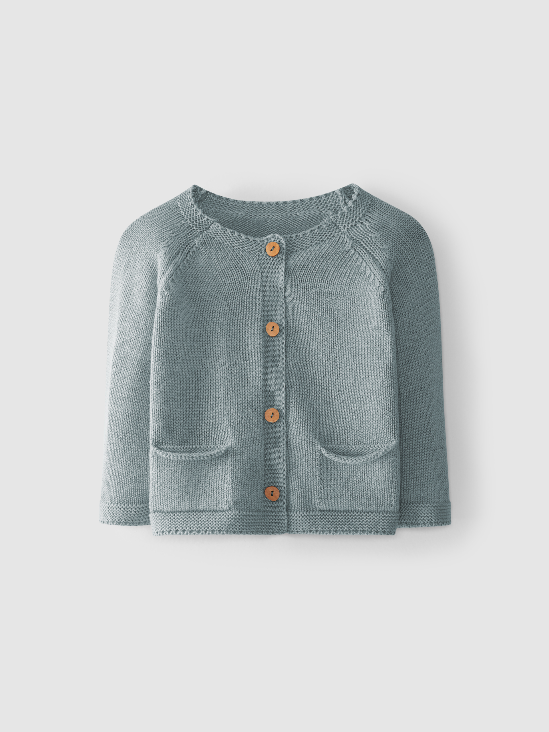 Casaco tricotado com bolsos