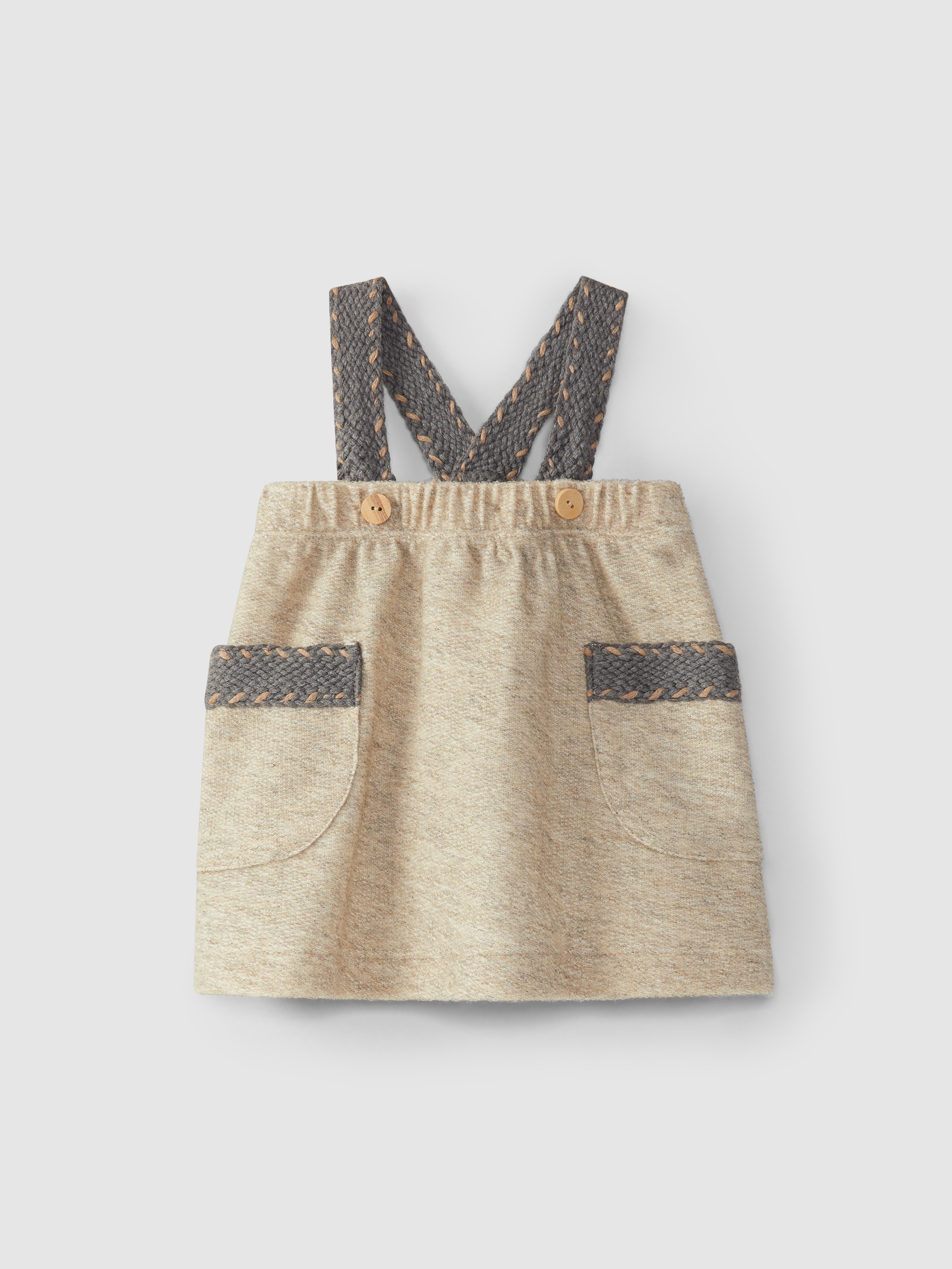 Falda de tirantes con bolsillos en felpa polar