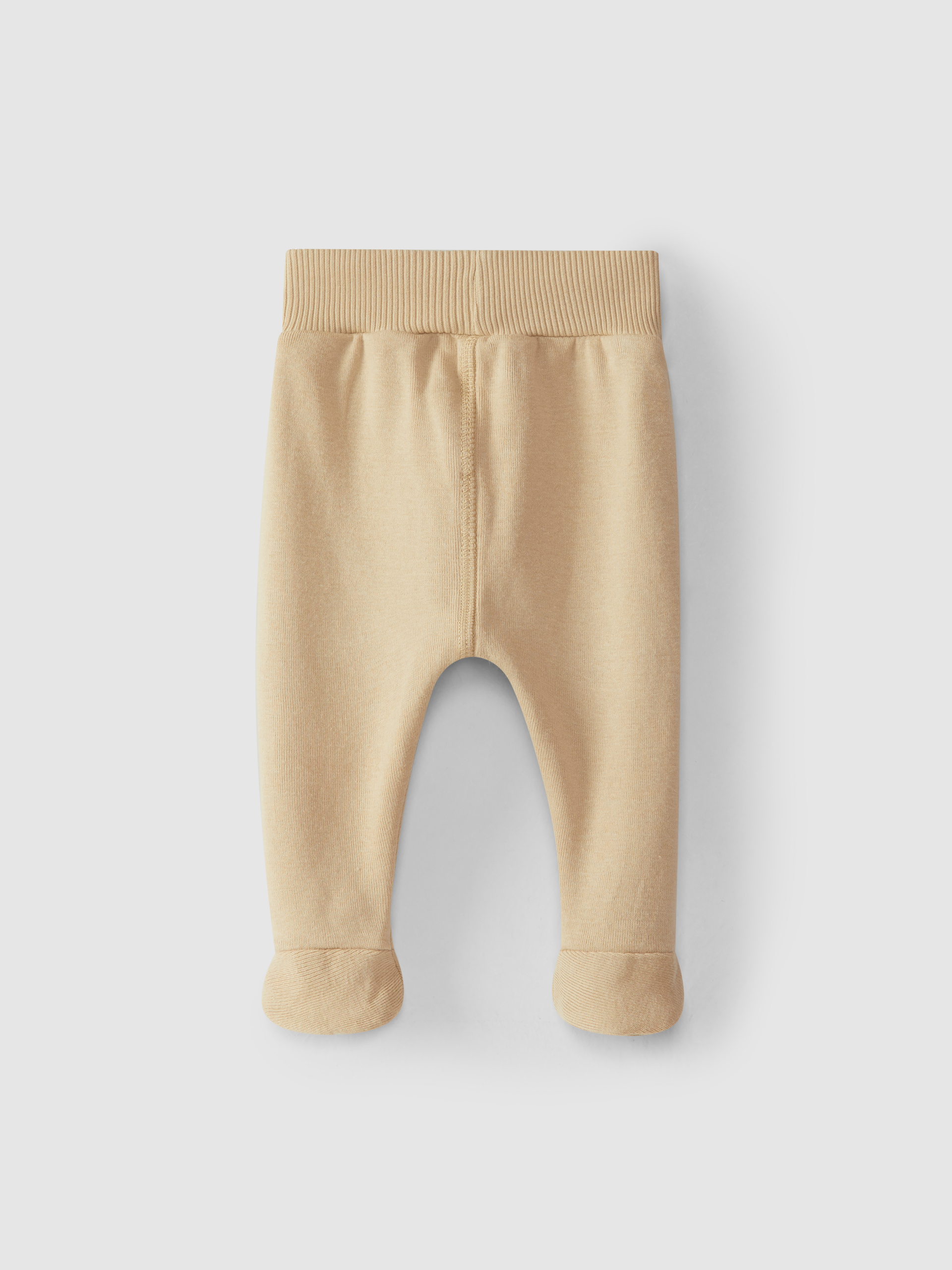 Calças lisas com pé