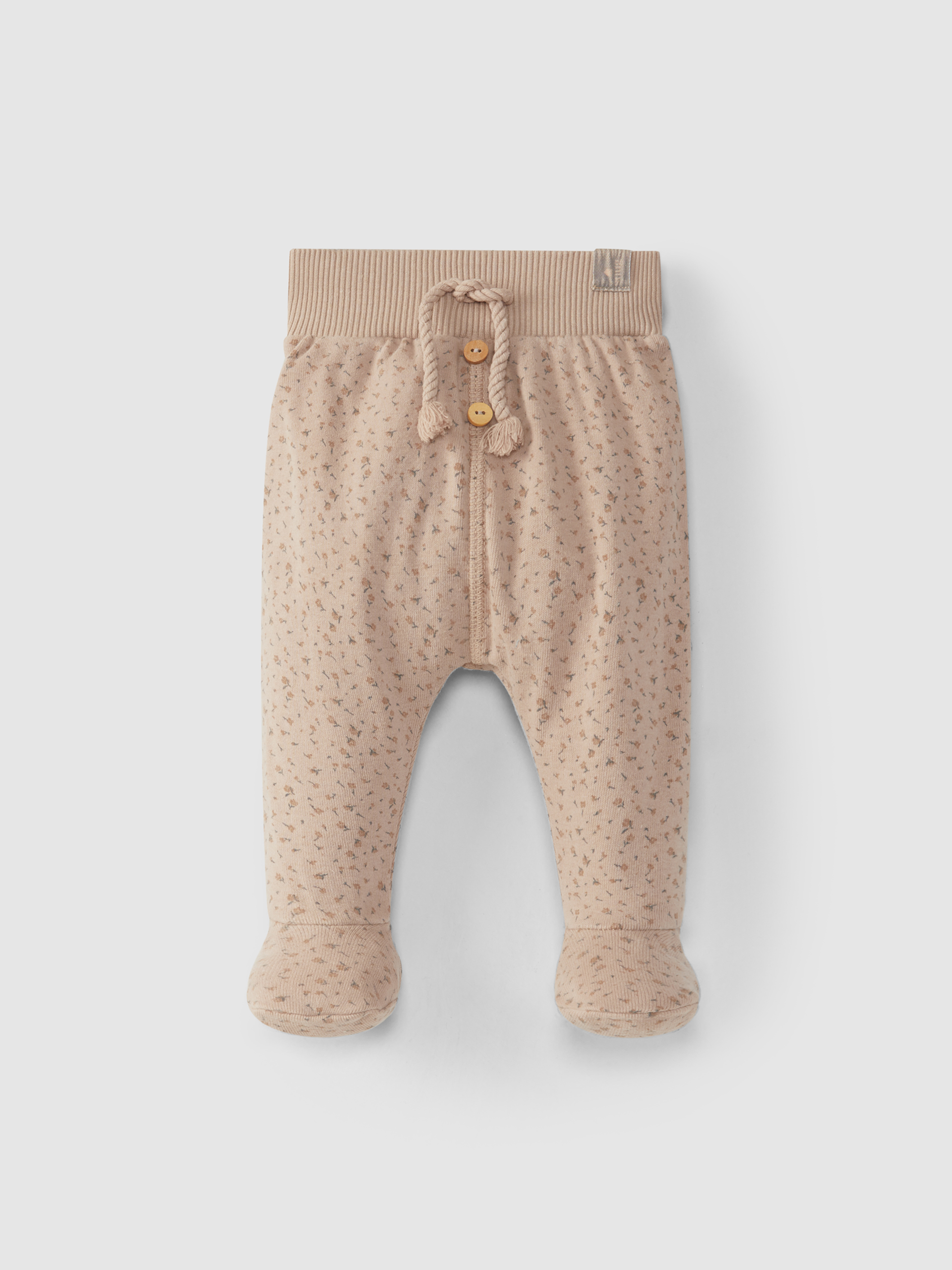 Calças com pé estampadas