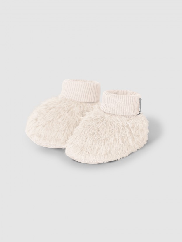 Booties in organic cotton fur