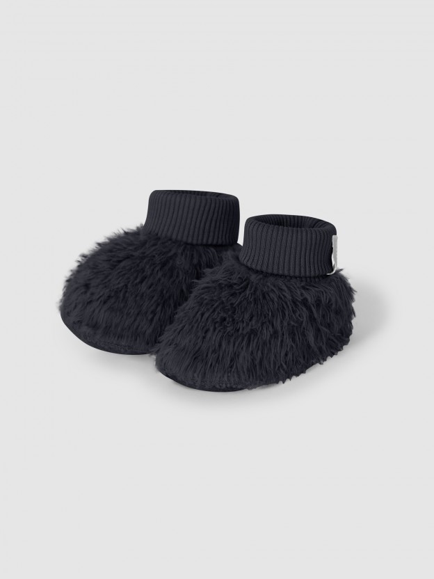 Booties in organic cotton fur