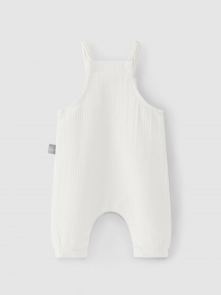 Peto liso con bolsillo. Peto liso con bolsillo.