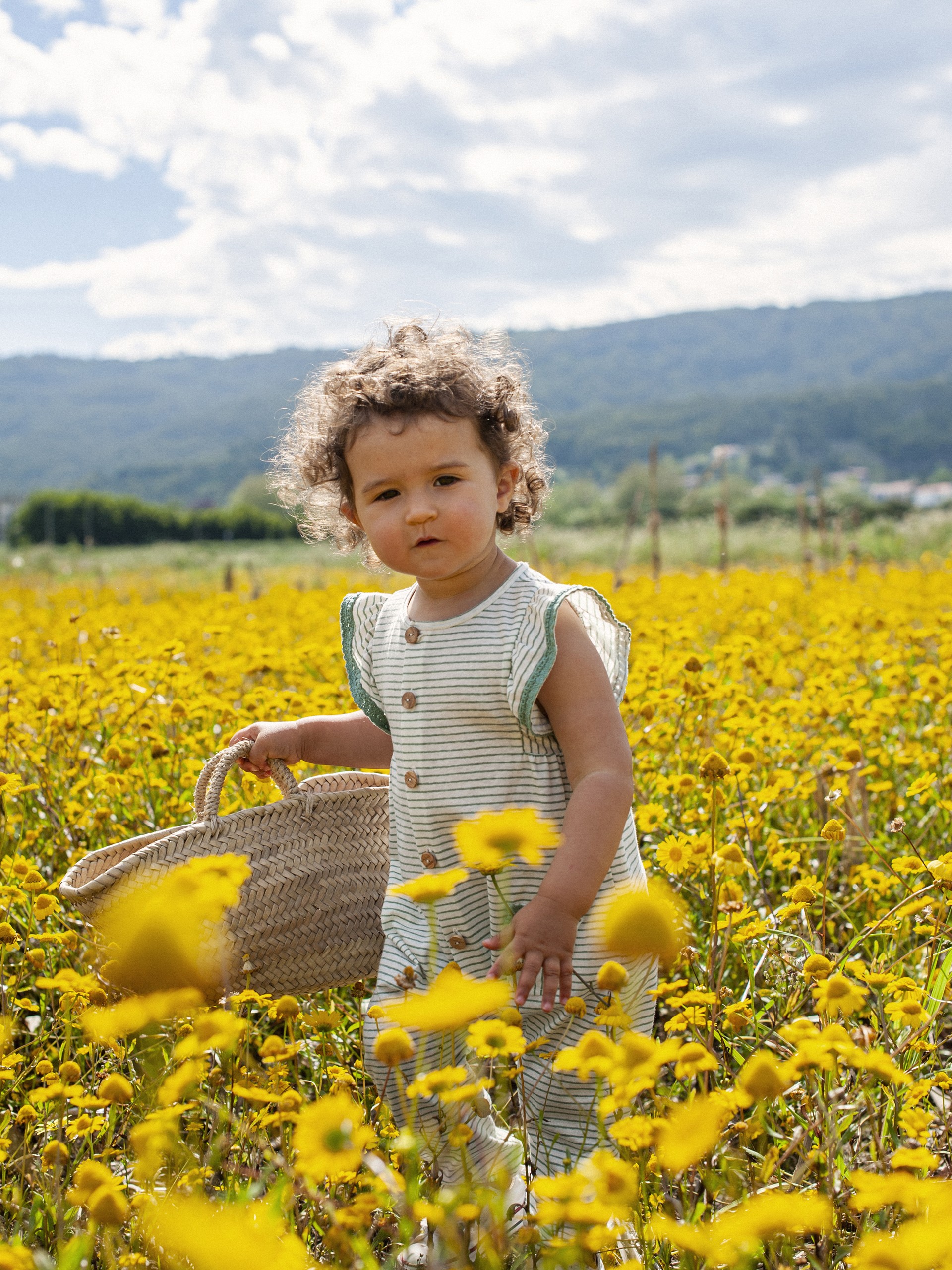 Macacão de riscas mangas em folho