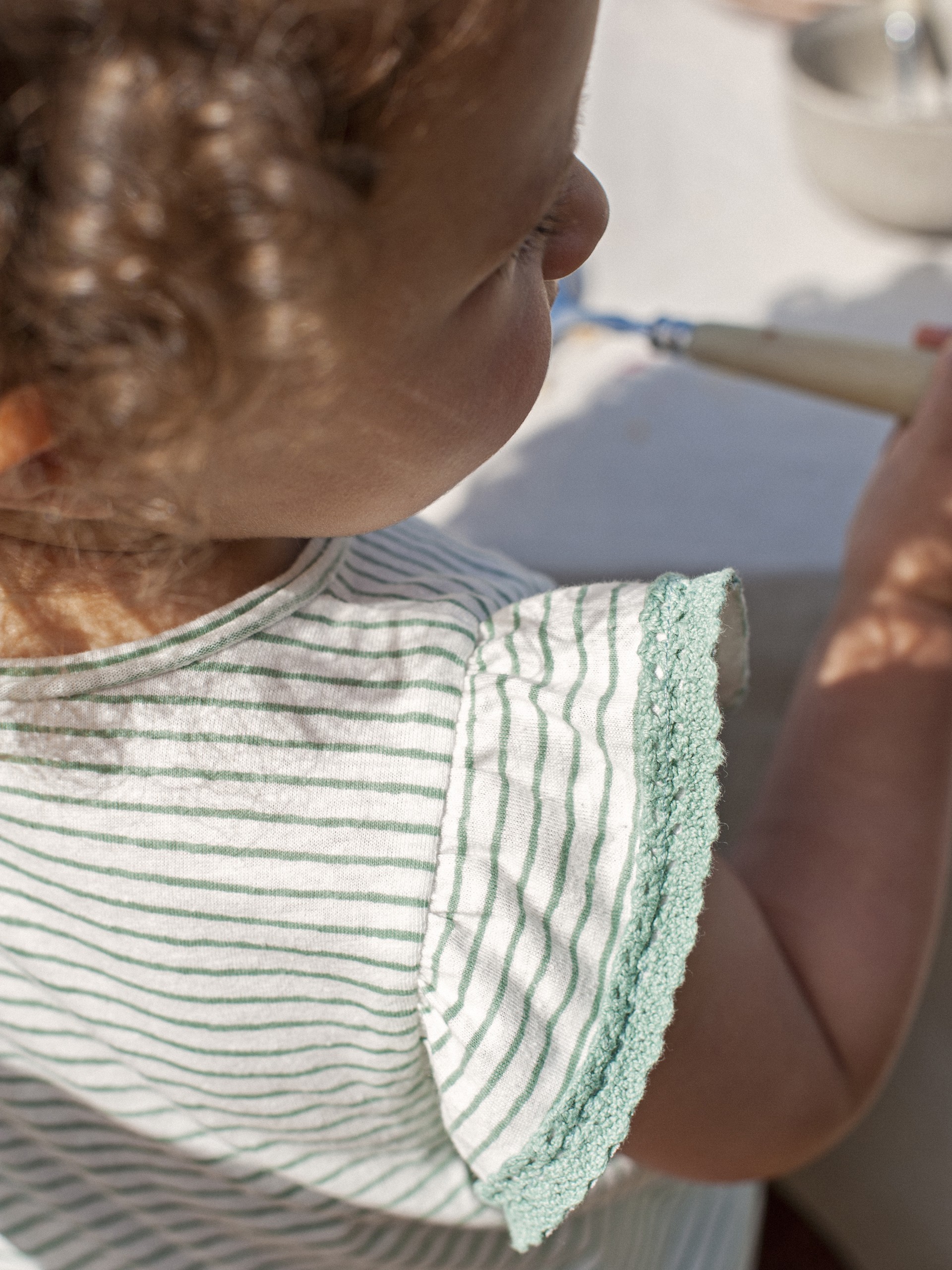 Macacão de riscas mangas em folho