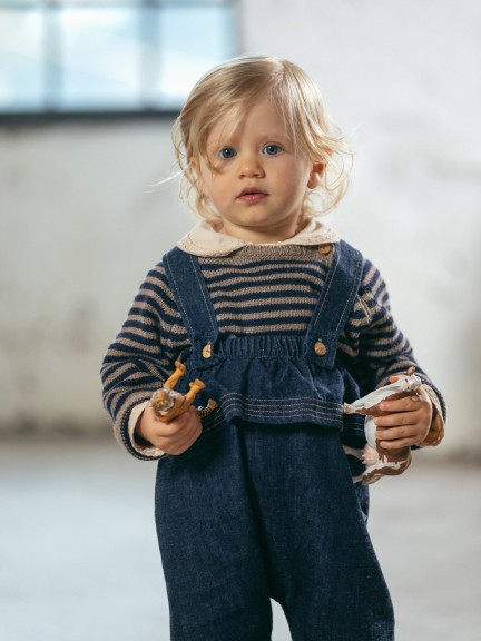 Dungarees with ruffle in organic cotton denim