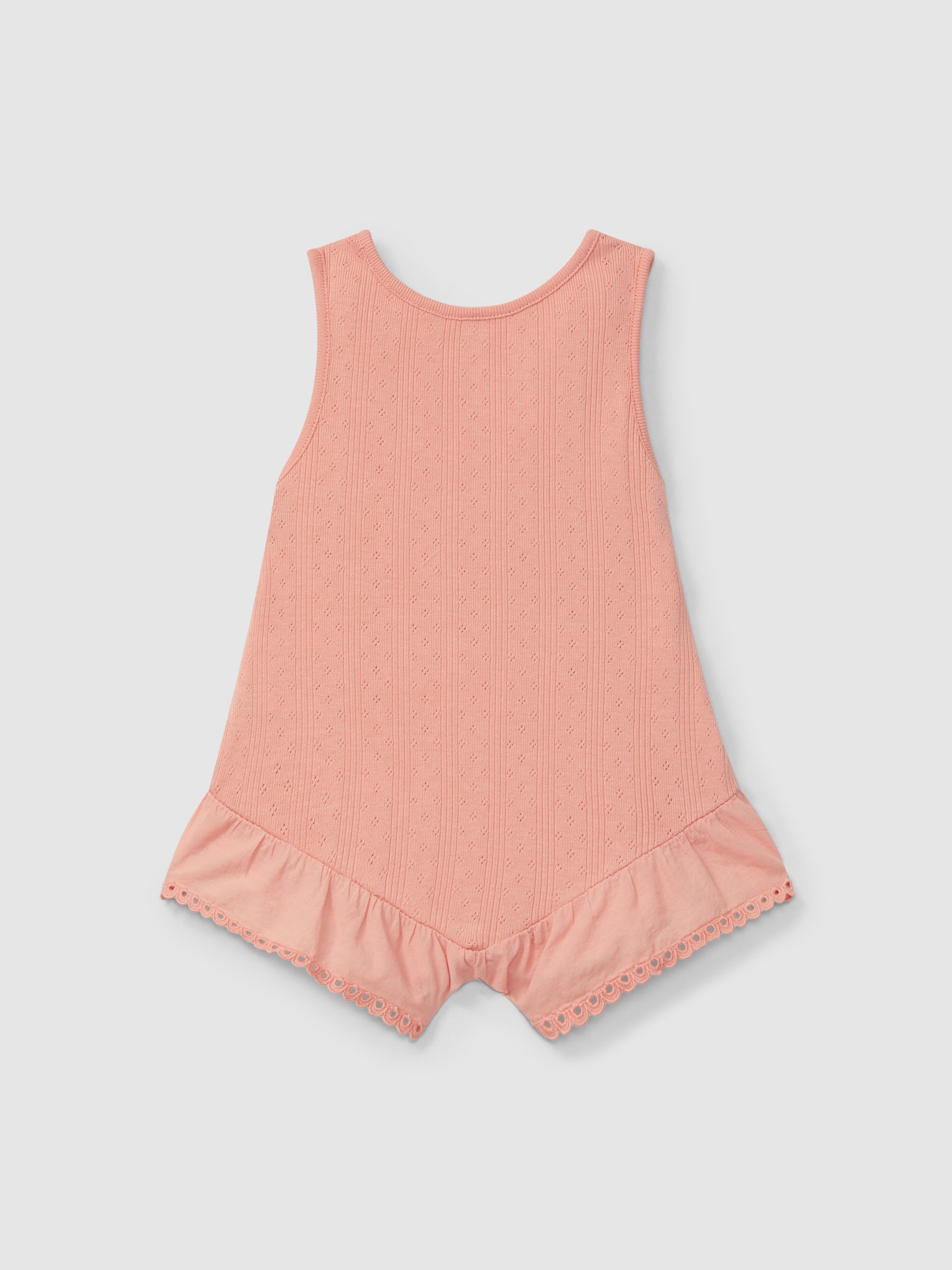 Mono ajour con bordado inglés