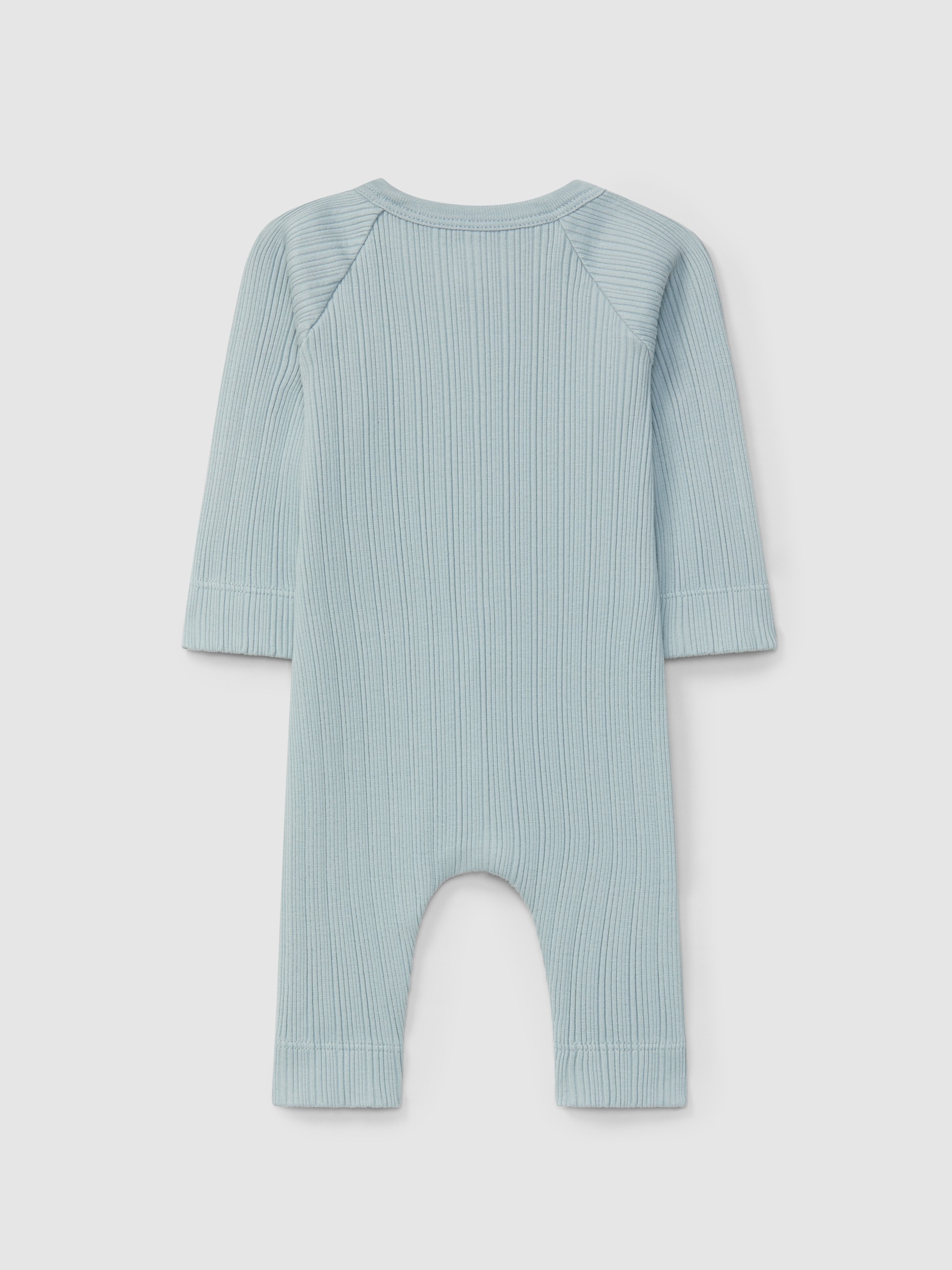 Trajecito con bolsillo en punto acanalado