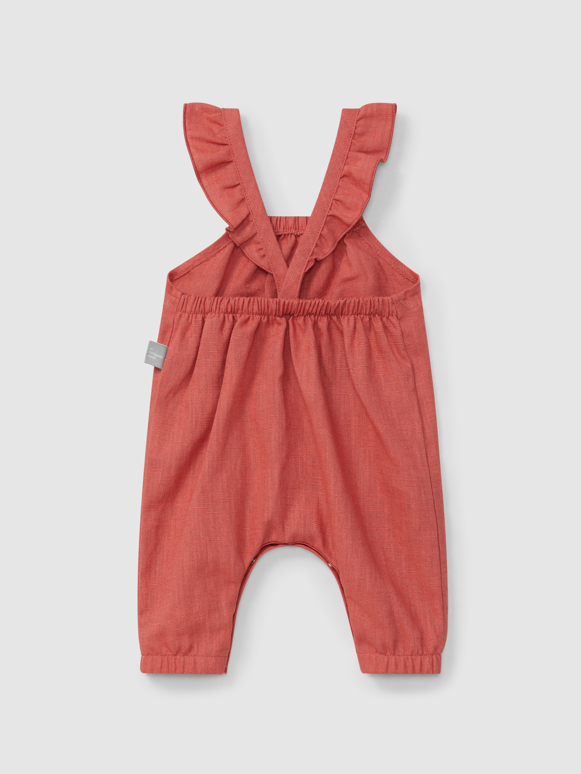 Peto liso de lino con algodón y tirantes con volante