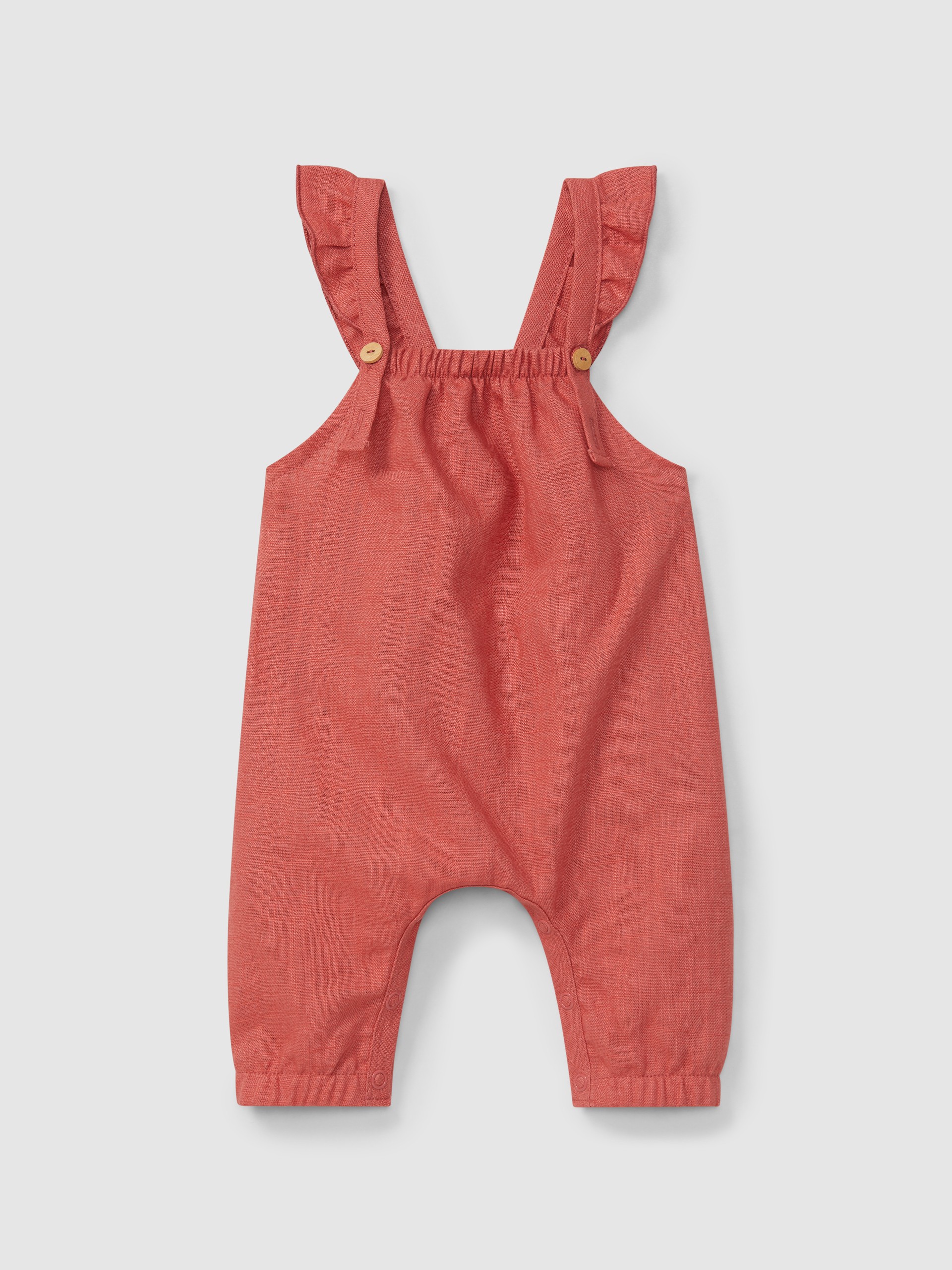 Peto liso de lino con algodón y tirantes con volante