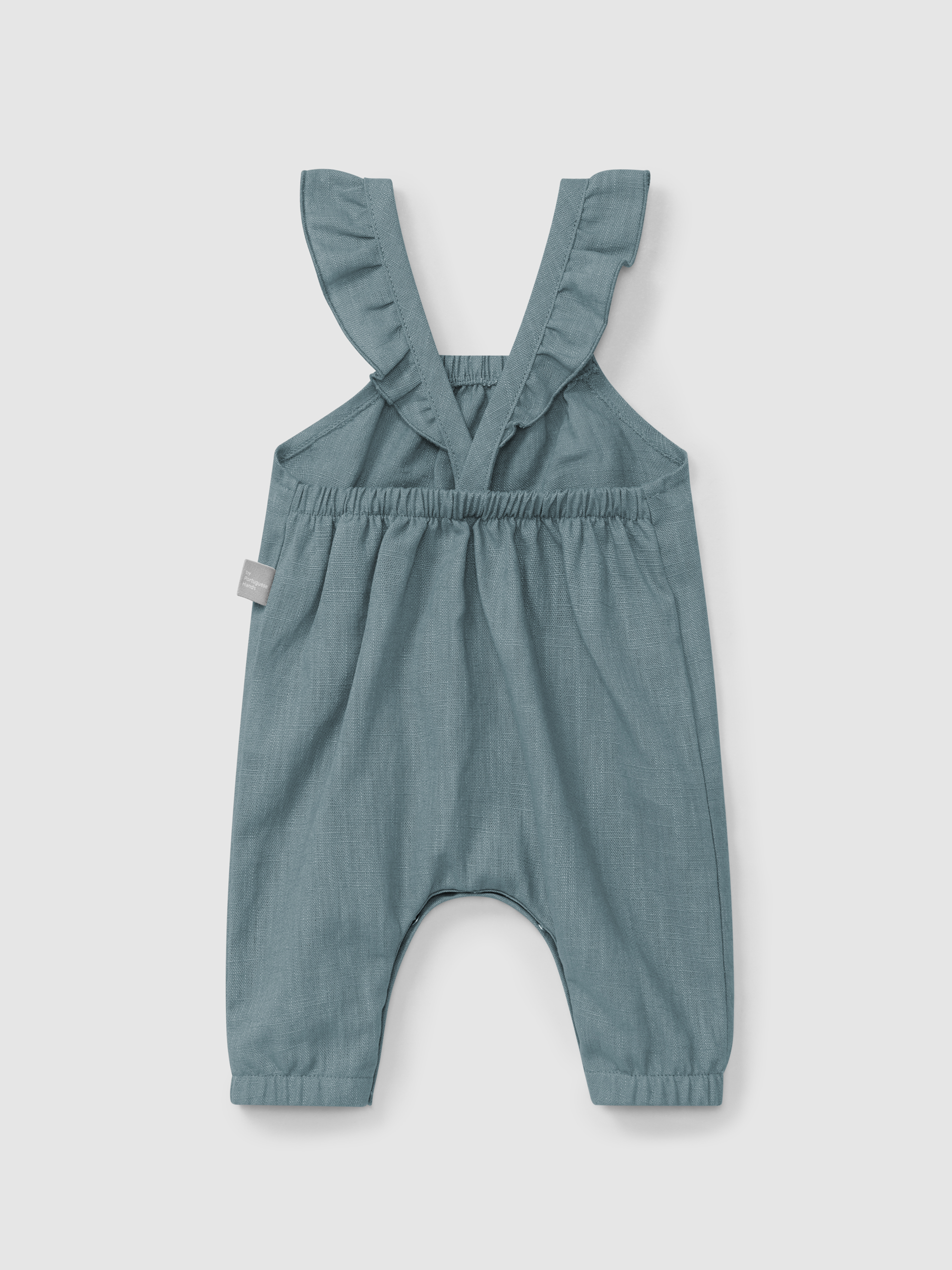 Jardineiras lisas em linho com algodão e alças com folho