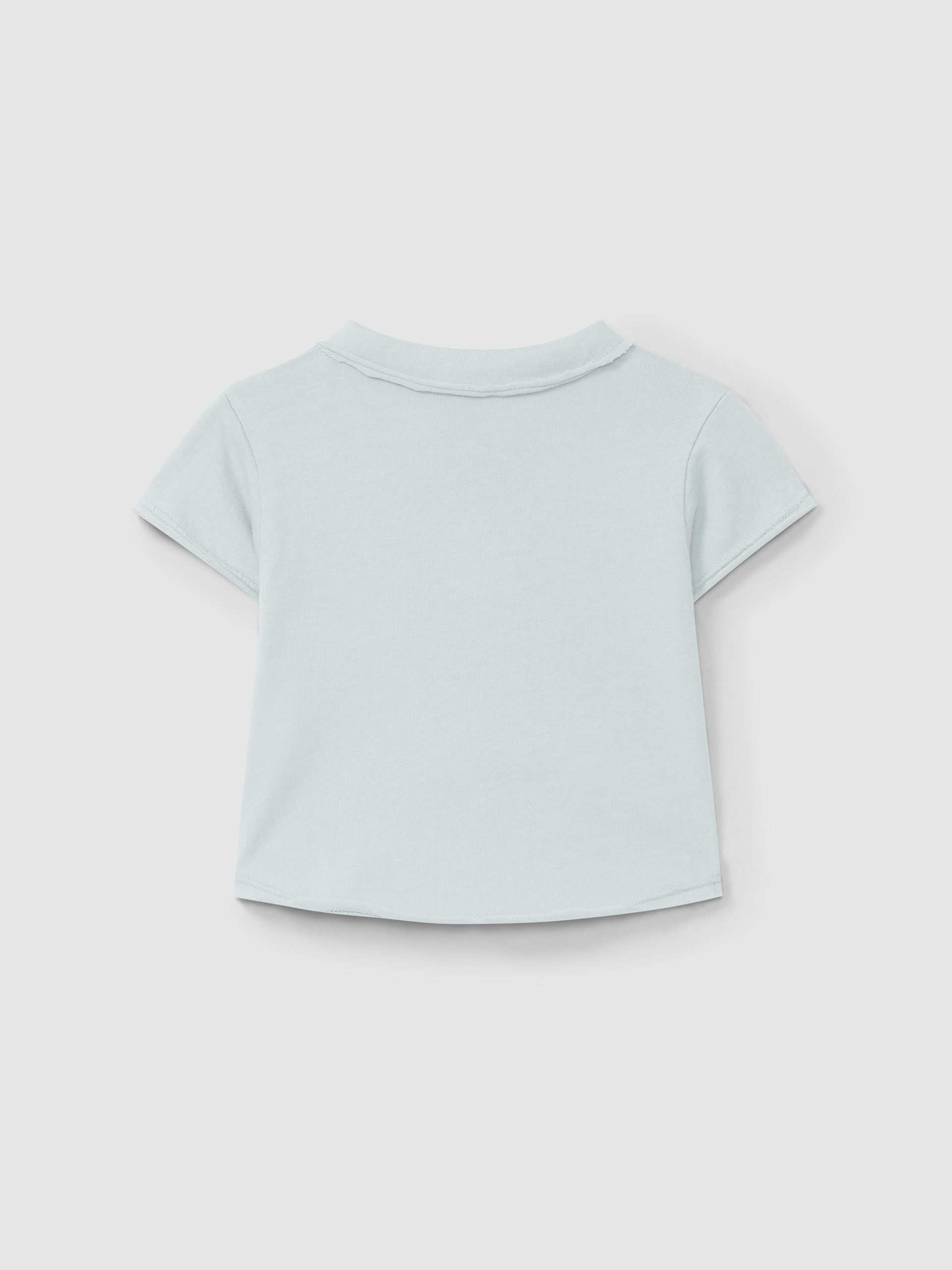 Polo liso con bolsillo