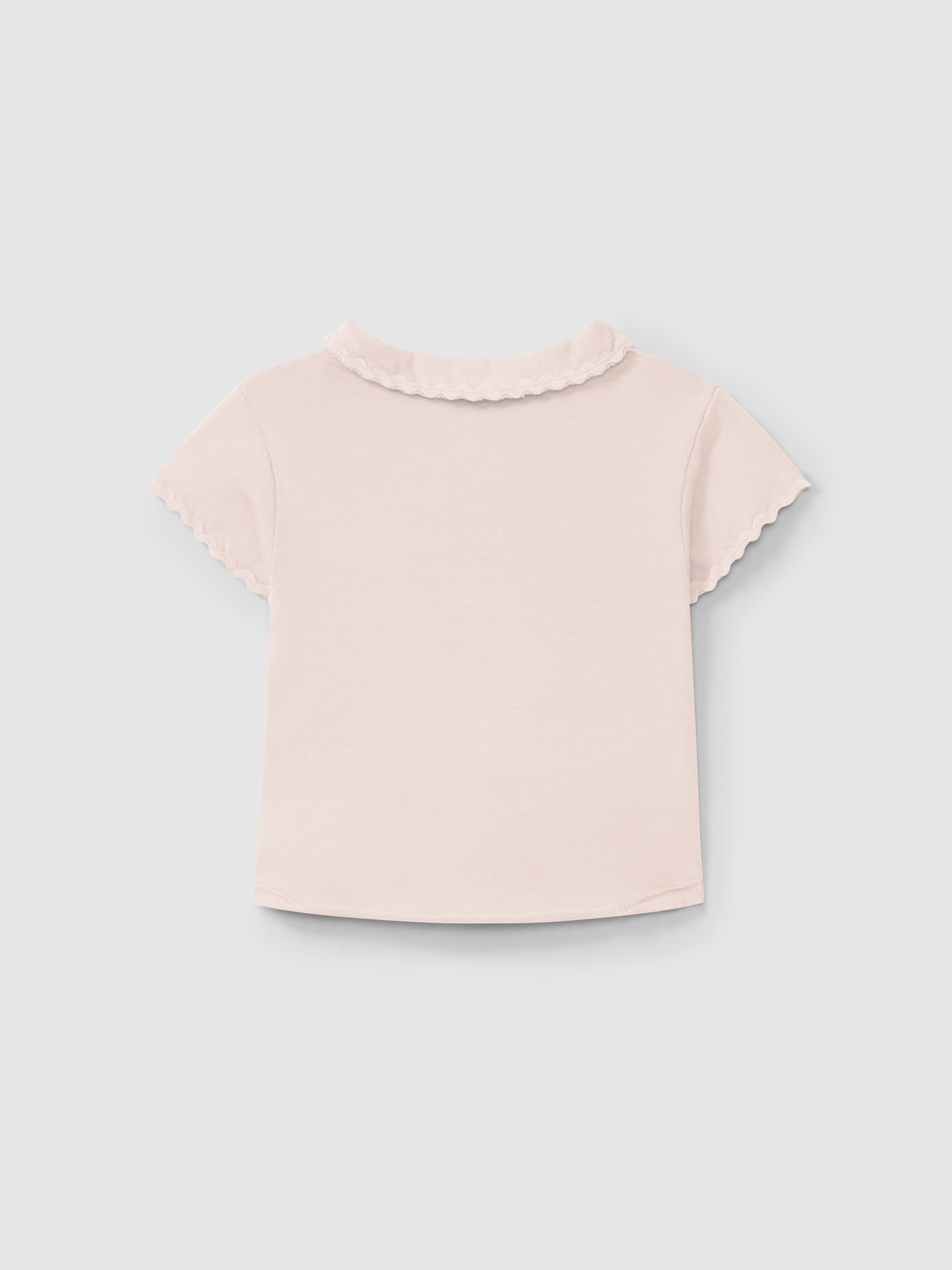 Polo liso con detalle de zigzag