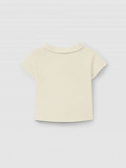 Polo liso con detalle de zigzag Polo liso con detalle de zigzag