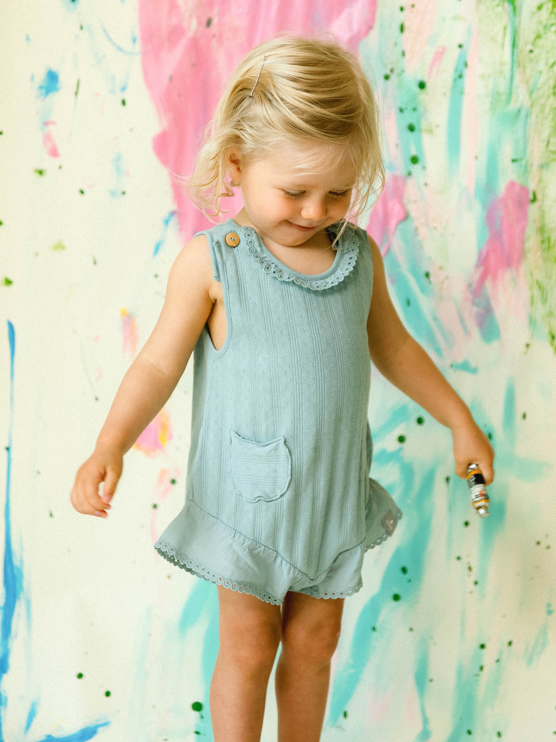 Macacão ajour com bordado inglês