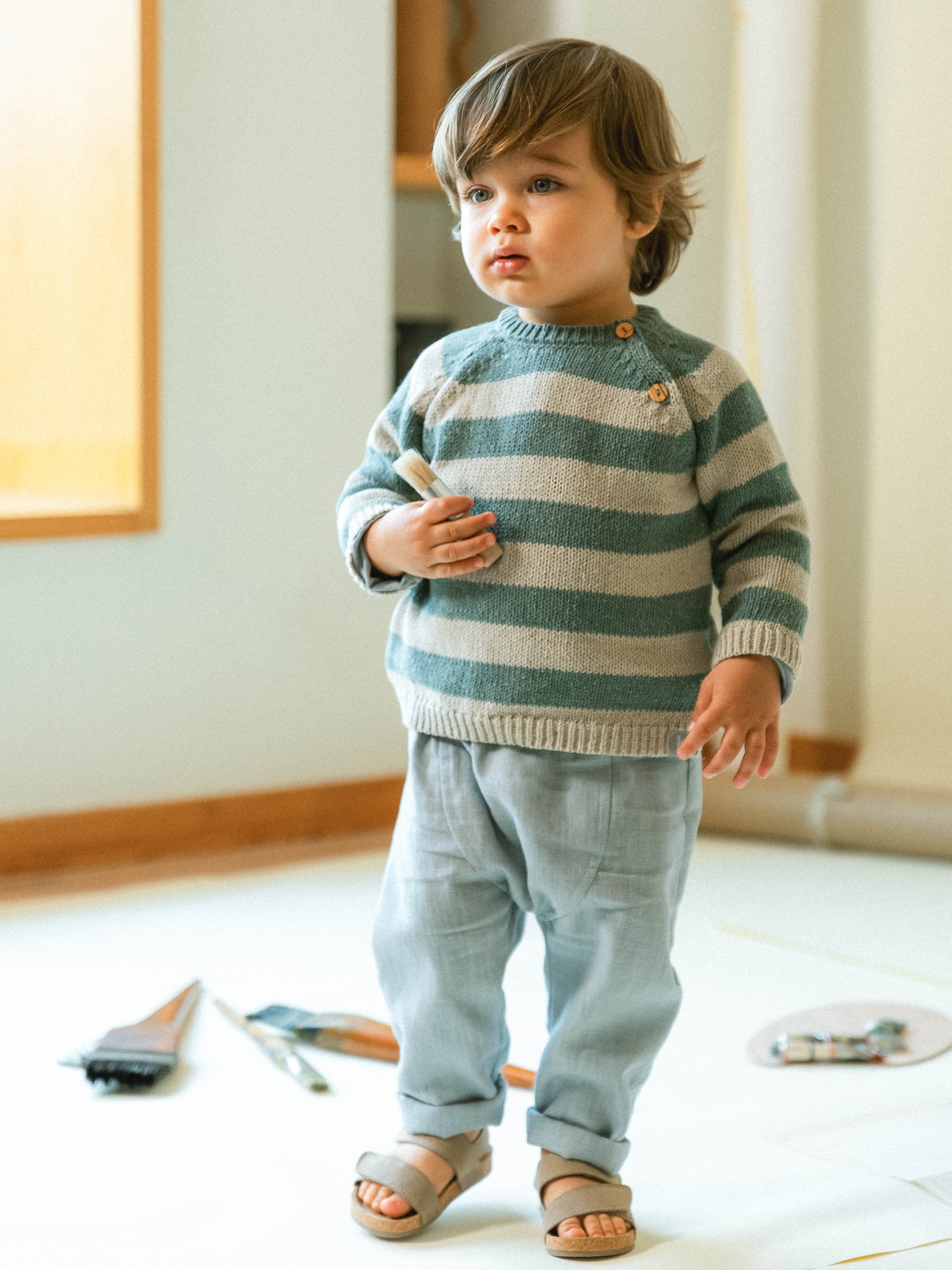 Camisola tricotada de riscas