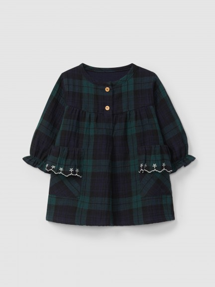 Check dress with embroidered ruffled pocket detail