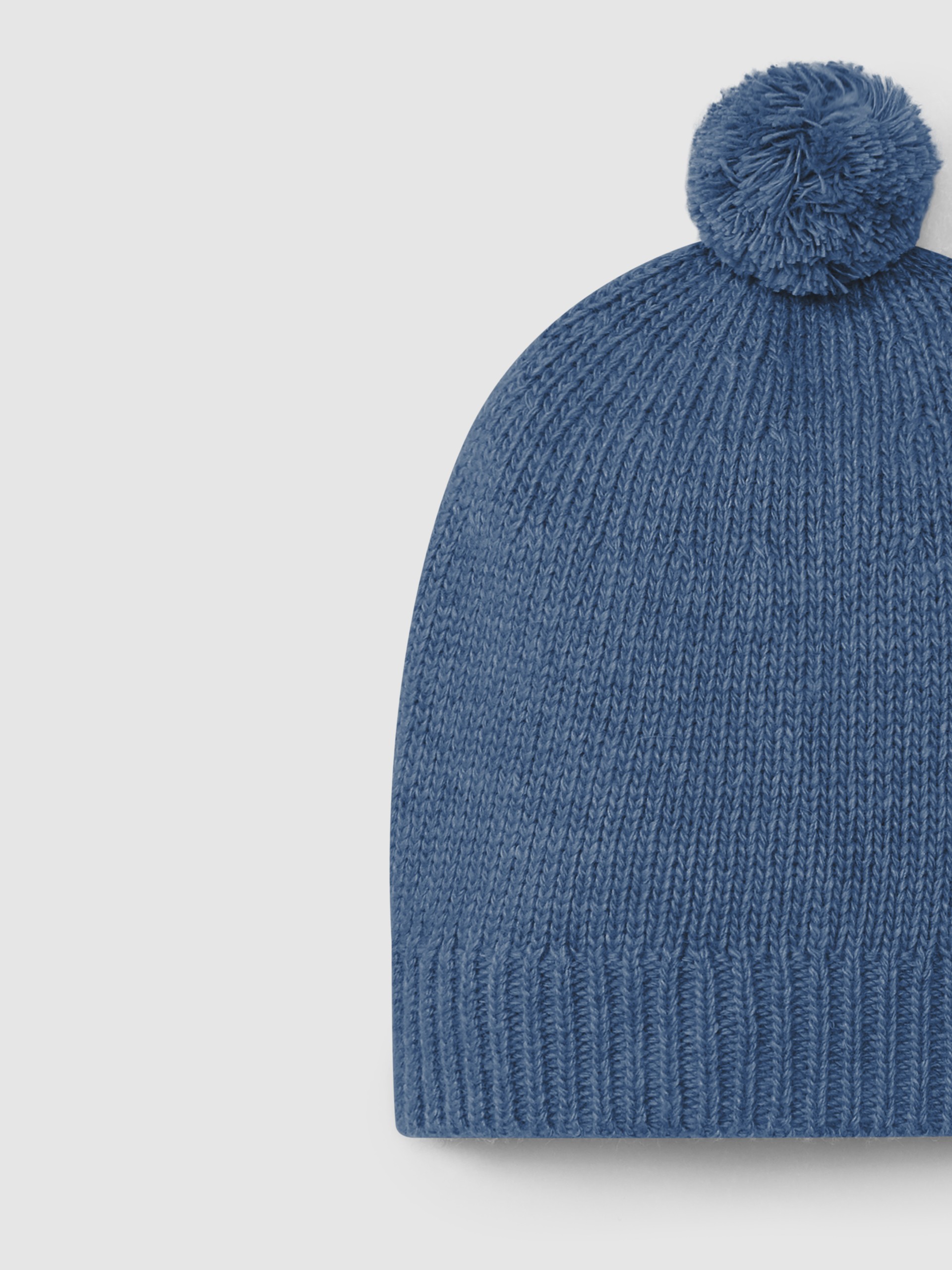 Knitted beanie with pom-pom