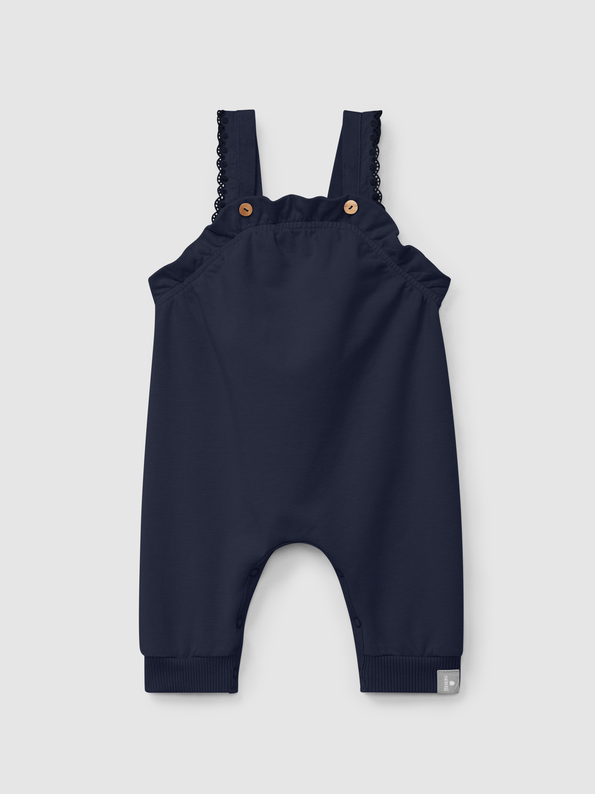 Plush dungarees with ruffled detail with embroidery