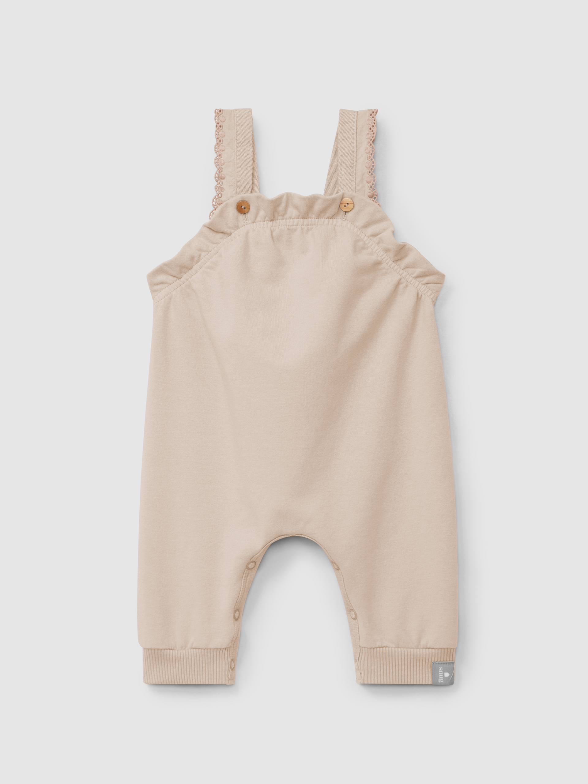 Plush dungarees with ruffled detail with embroidery