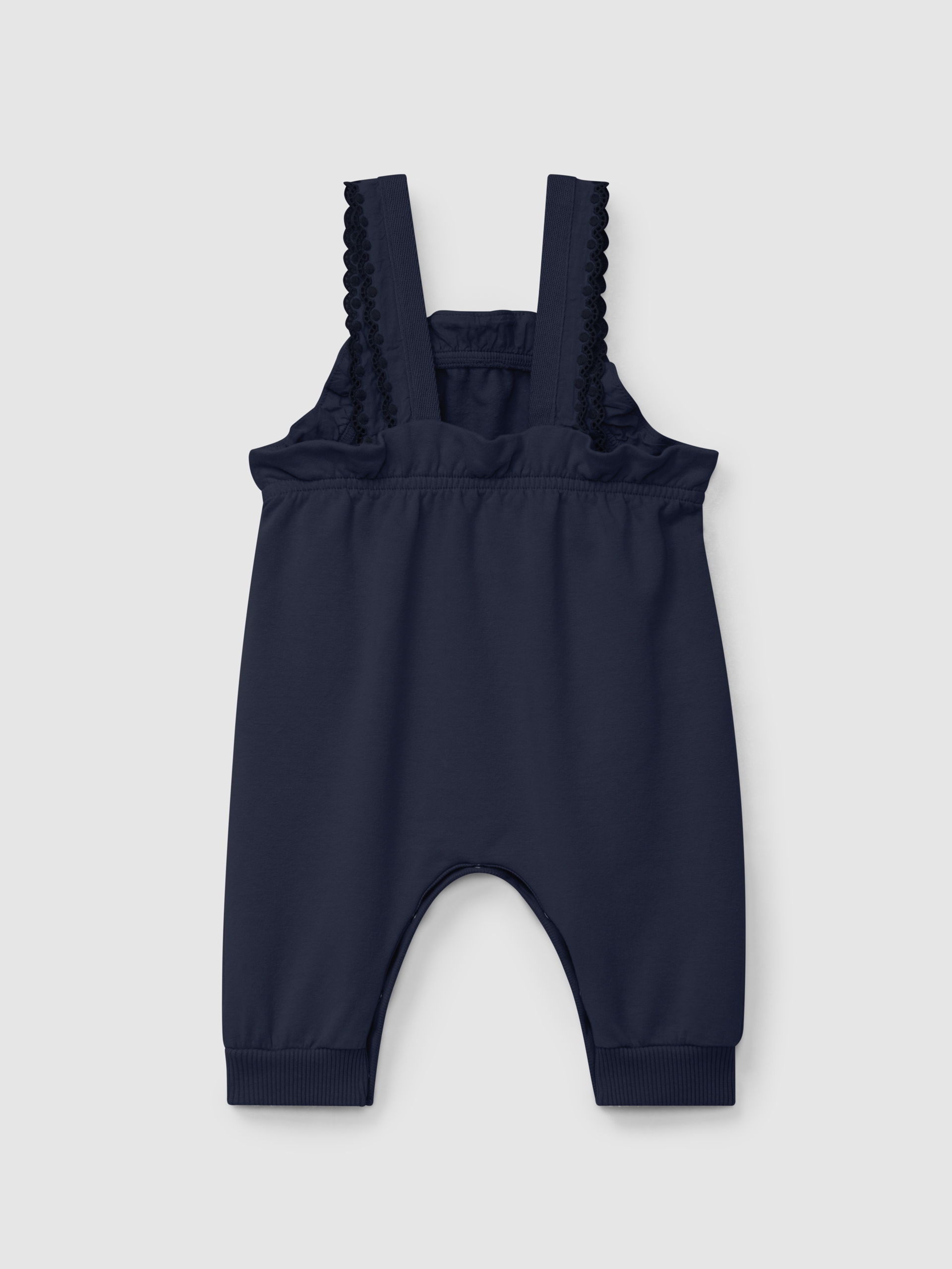 Plush dungarees with ruffled detail with embroidery