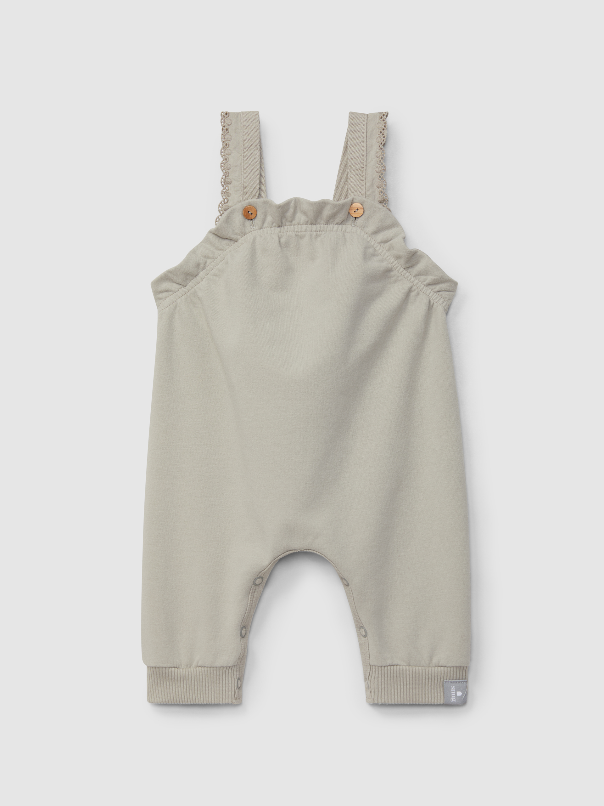 Plush dungarees with ruffled detail with embroidery