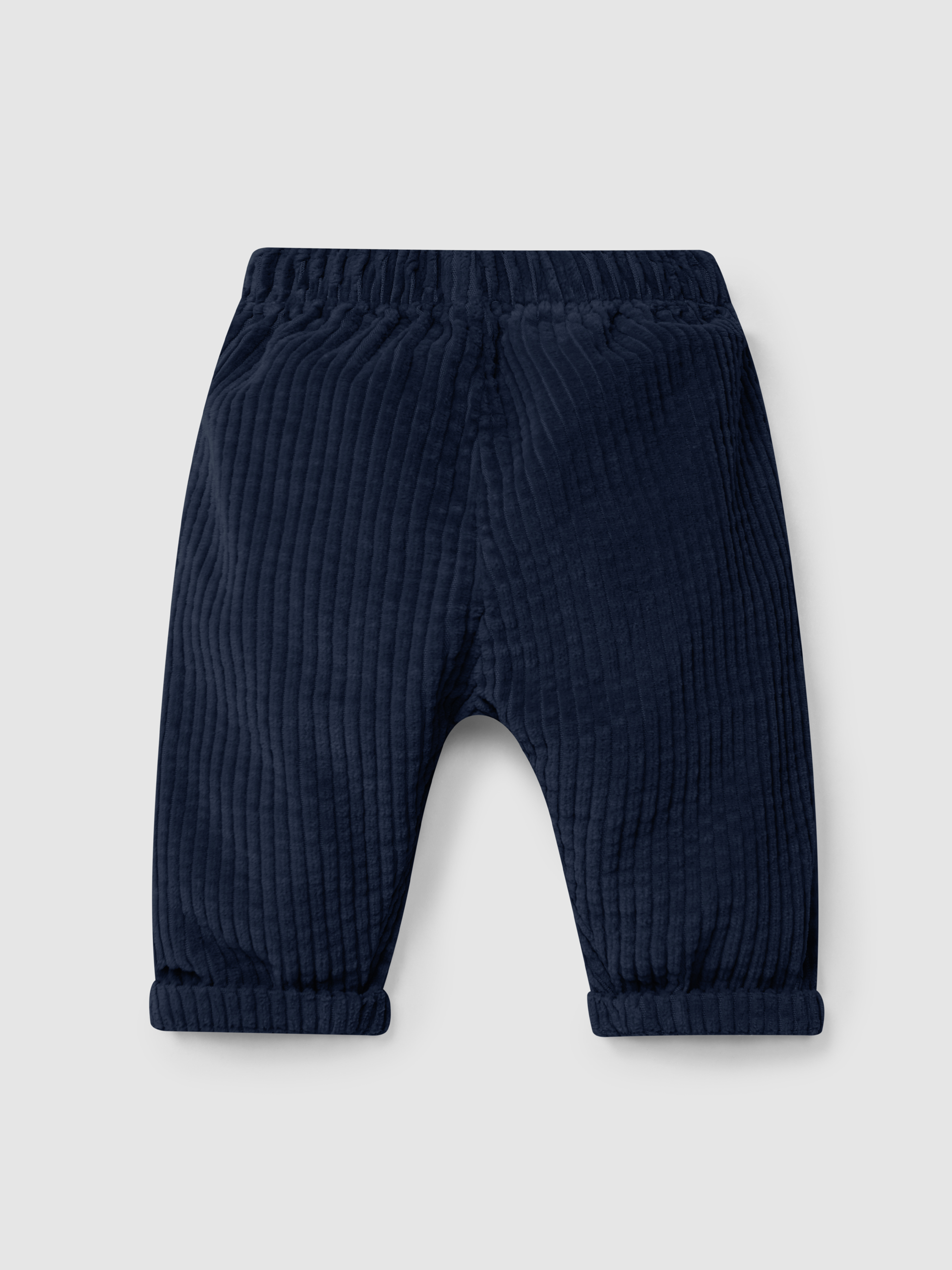 Pull-up pants in ribbed velvet with pockets