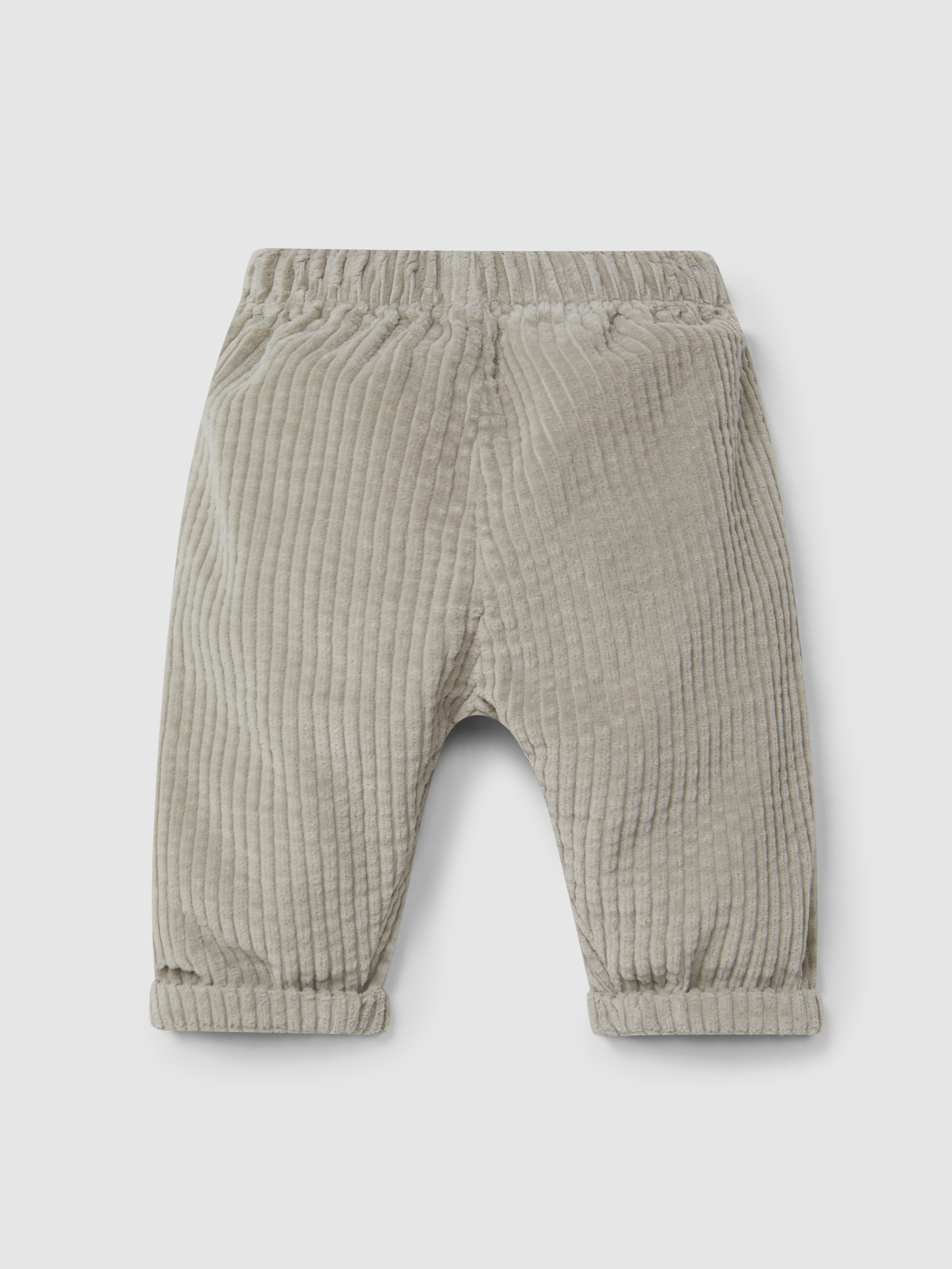 Pull-up pants in ribbed velvet with pockets