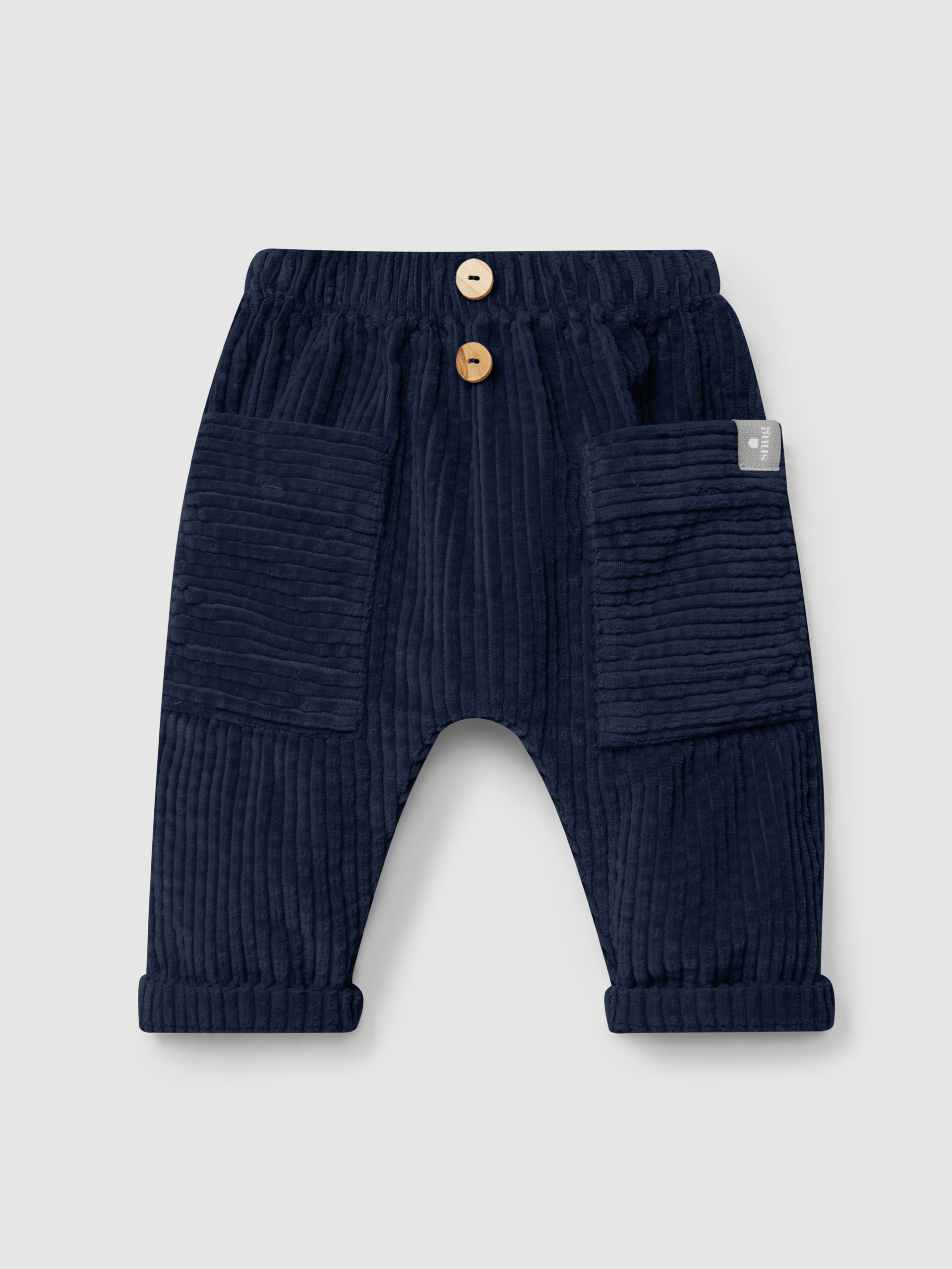 Pull-up pants in ribbed velvet with pockets