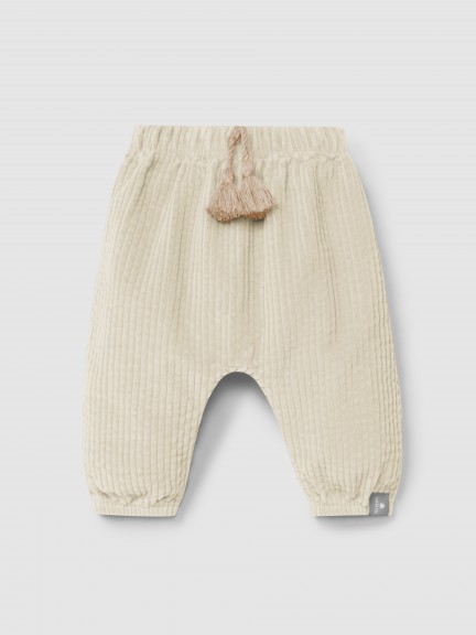 Pull-up pants in ribbed velvet and drawstring detail with pom-pom