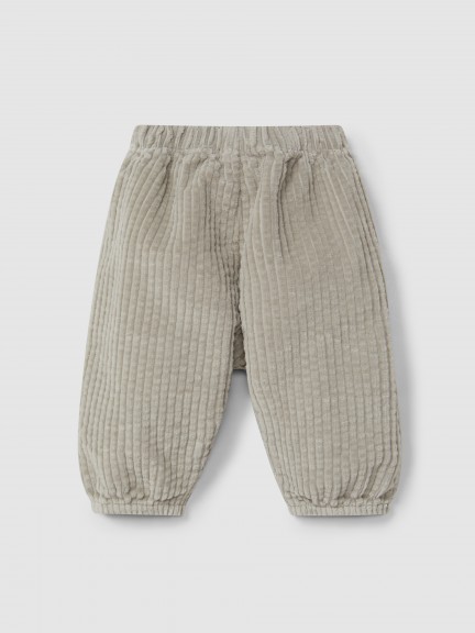 Pull-up pants in ribbed velvet and drawstring detail with pom-pom Pull-up pants in ribbed velvet and drawstring detail with pom-pom