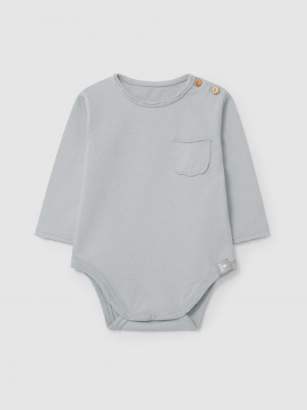 Collarless bodysuit in organic cotton with pocket