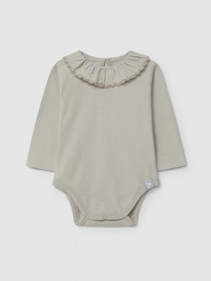 Bodysuit in organic cotton with ruffled embroidered collar