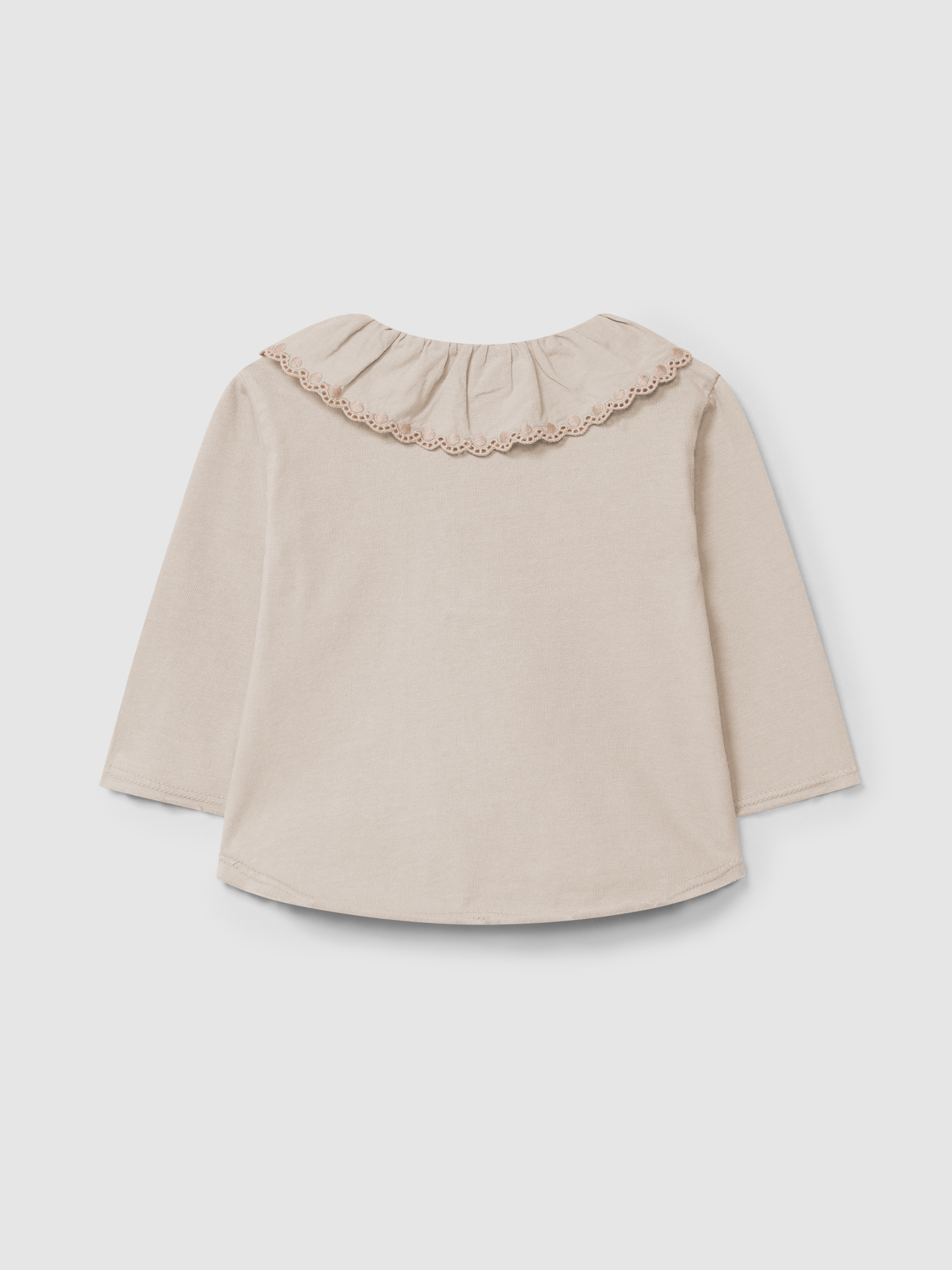 Longsleeve in organic cotton with ruffled embroidered collar
