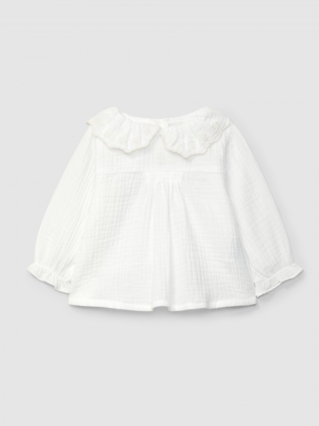 Muslin blouse with embroidered ruffled collar Muslin blouse with embroidered ruffled collar