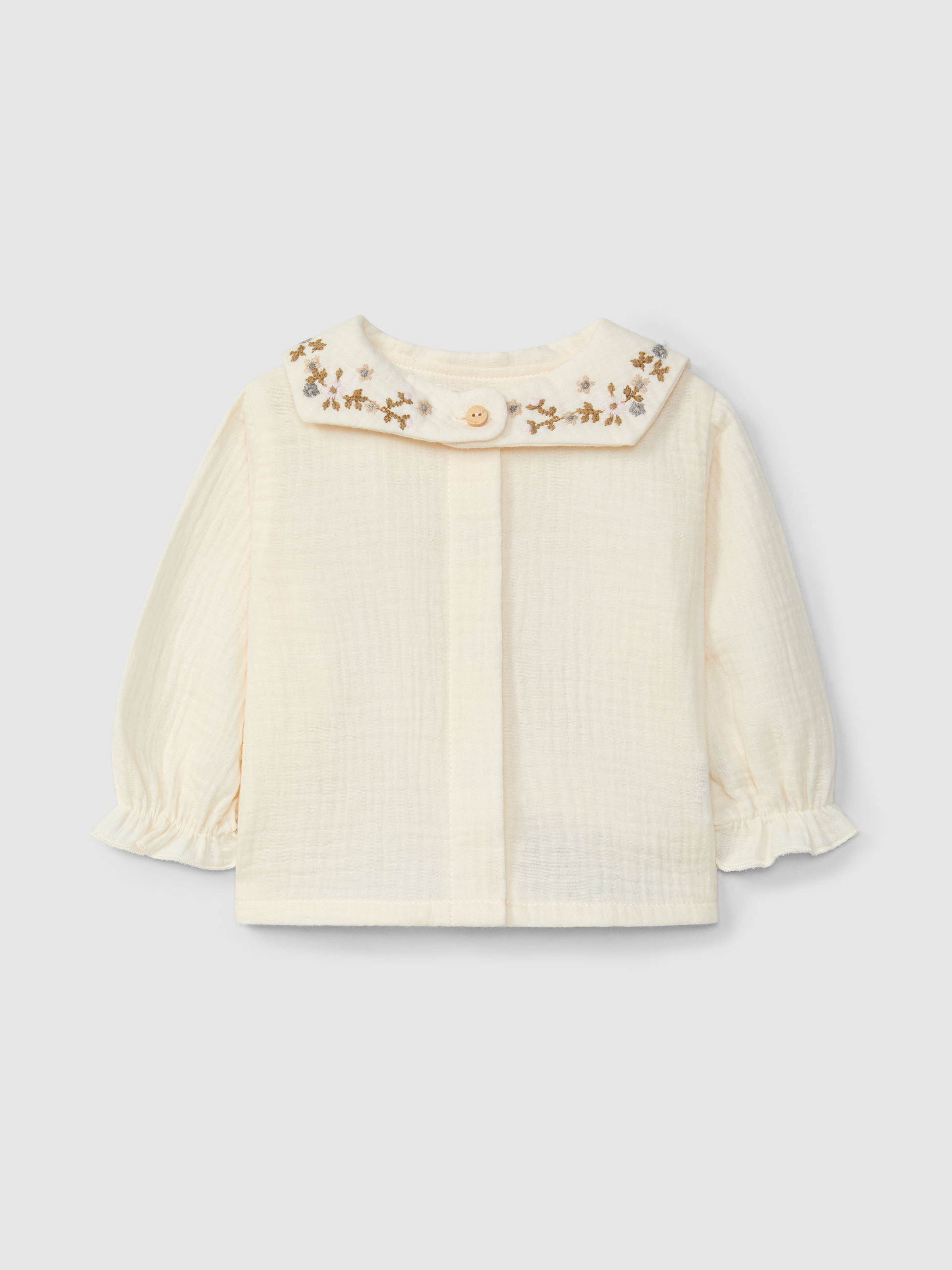 Muslin blouse with embroidered floral collar