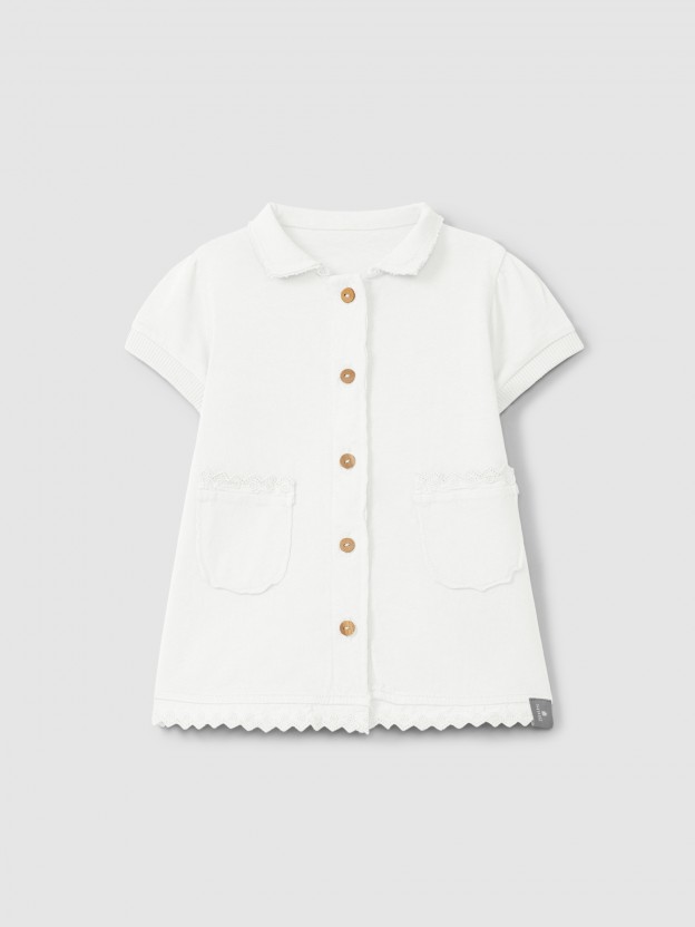 Plain jersey dress with embroidered details Plain jersey dress with embroidered details