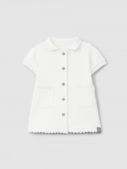 Plain jersey dress with embroidered details