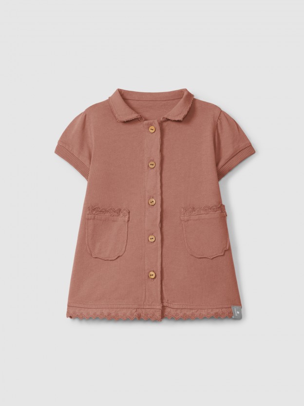 Plain jersey dress with embroidered details