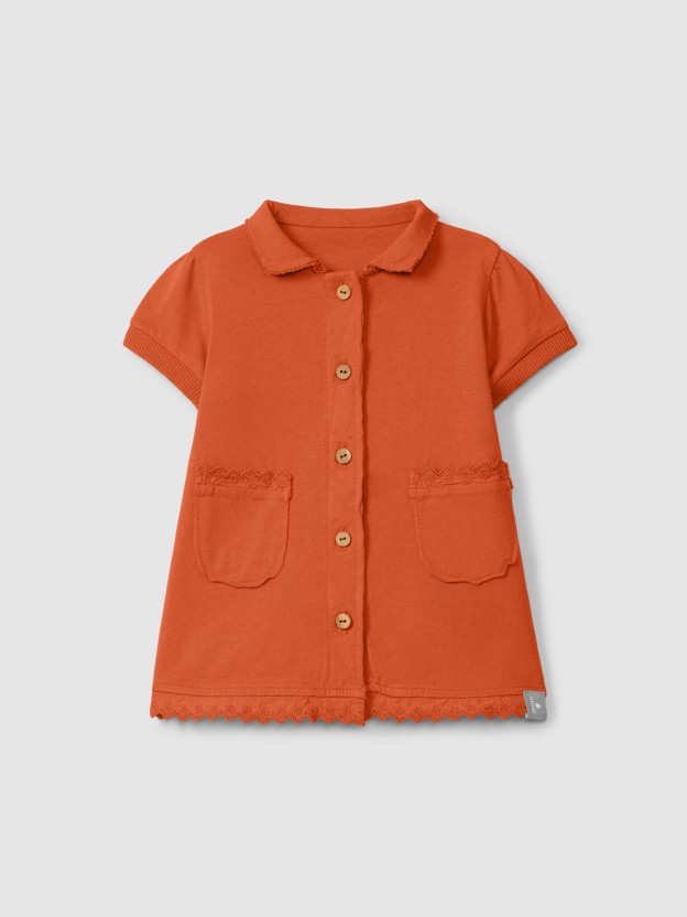 Plain jersey dress with embroidered details