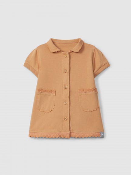 Plain jersey dress with embroidered details