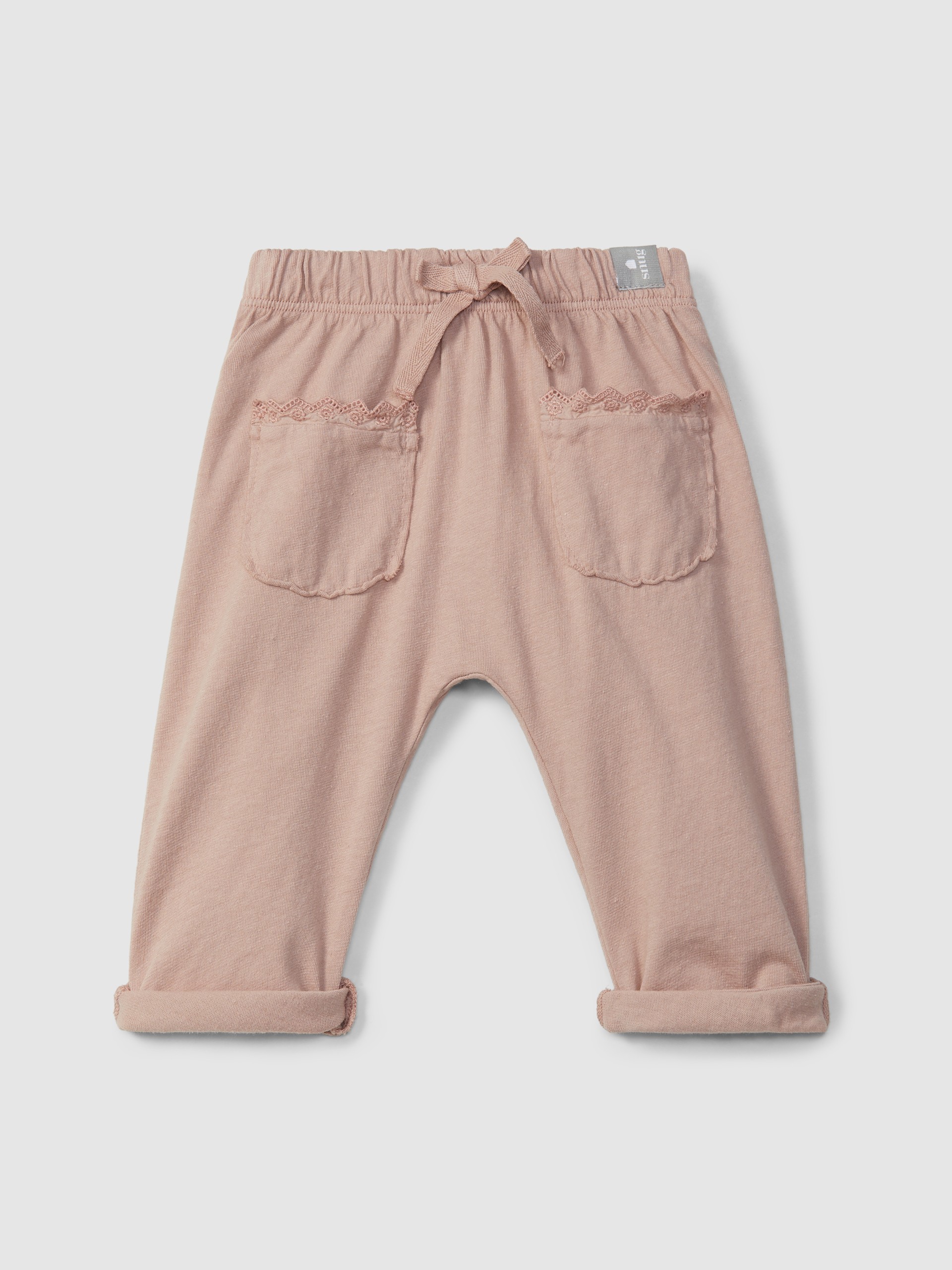 Plain jersey pull-up pants with embroidered details