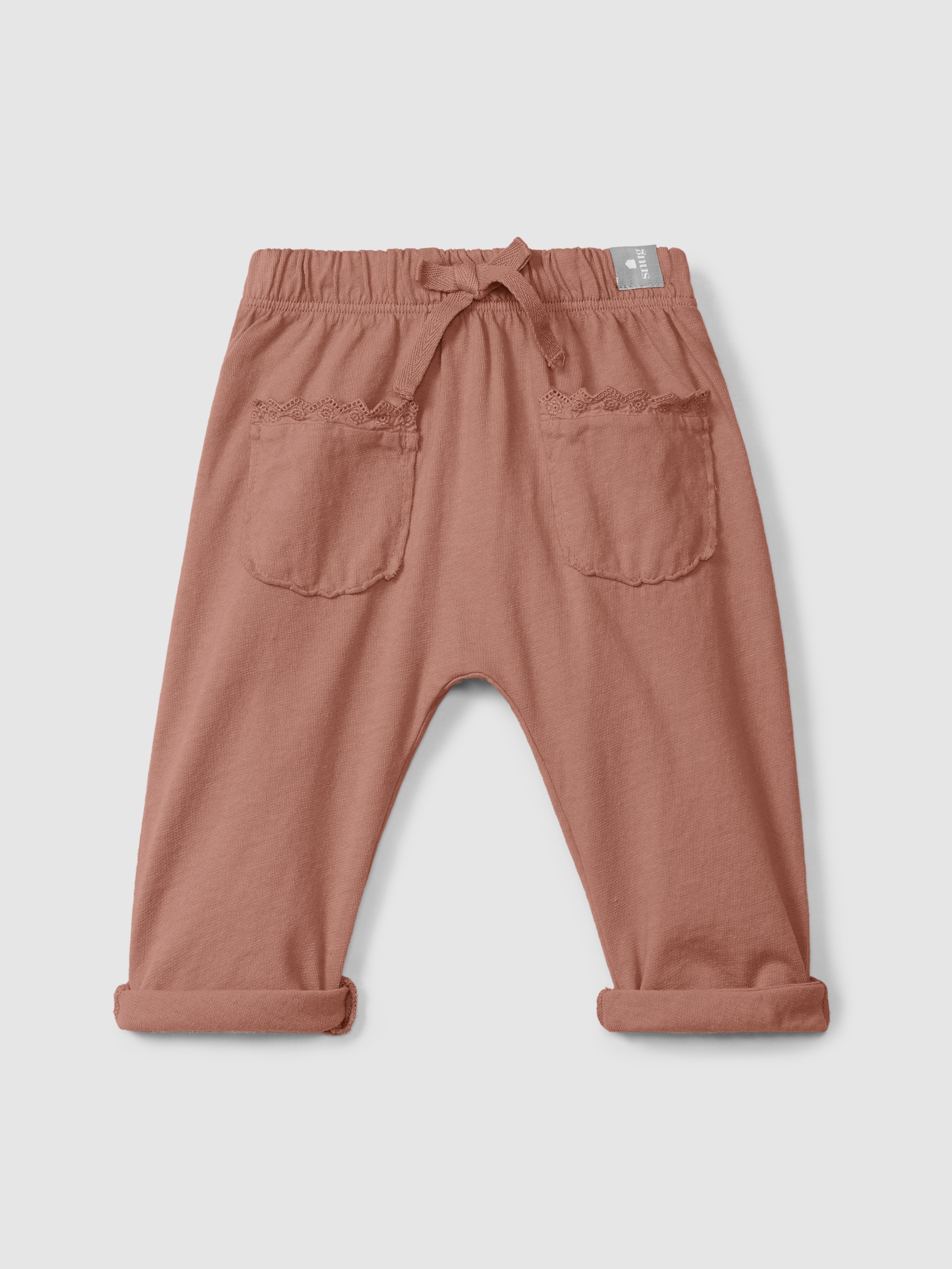 Plain jersey pull-up pants with embroidered details