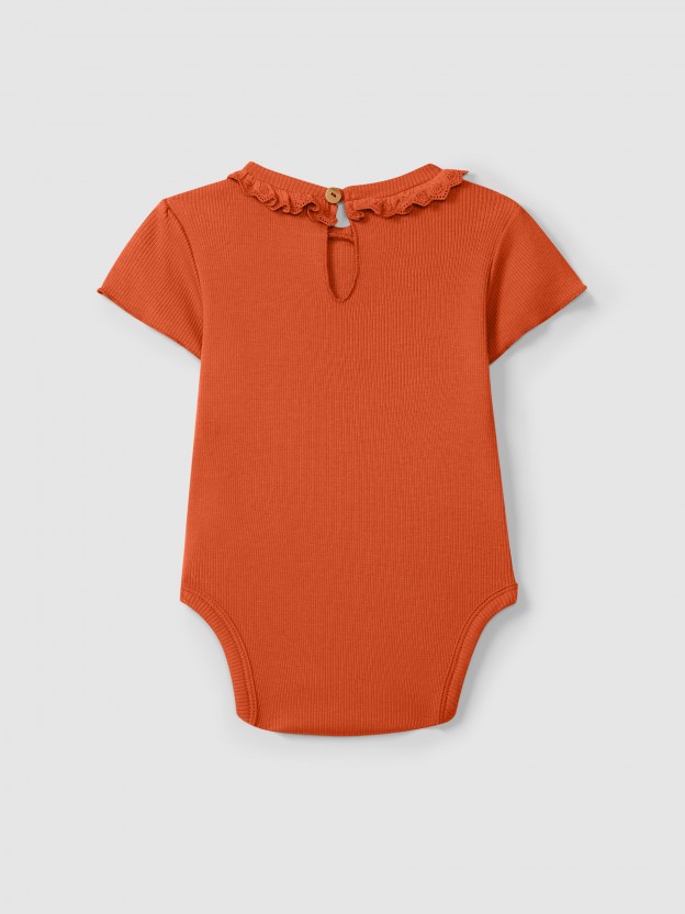 Bodysuit in ribbed jersey with English embroidery collar