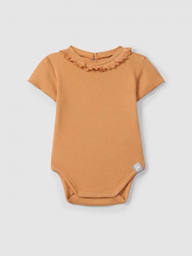 Bodysuit in ribbed jersey with English embroidery collar