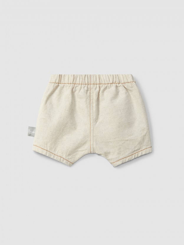 Organic style pull-up shorts with pocket