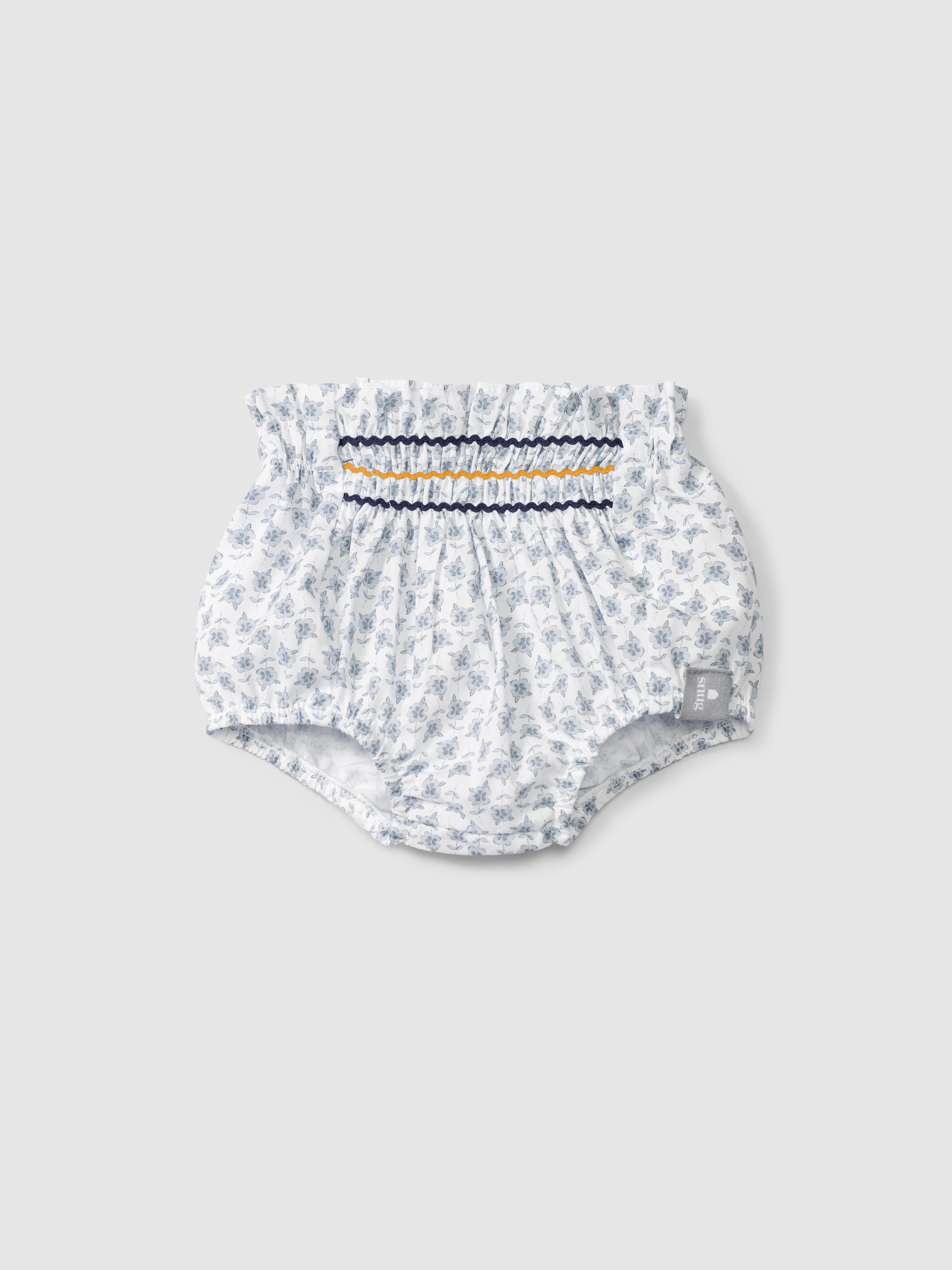 Floral pull-up diaper cover with rickrack detail