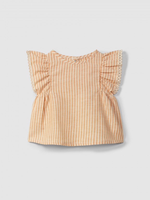 Blouse in striped fabric and English embroidery detail Blouse in striped fabric and English embroidery detail